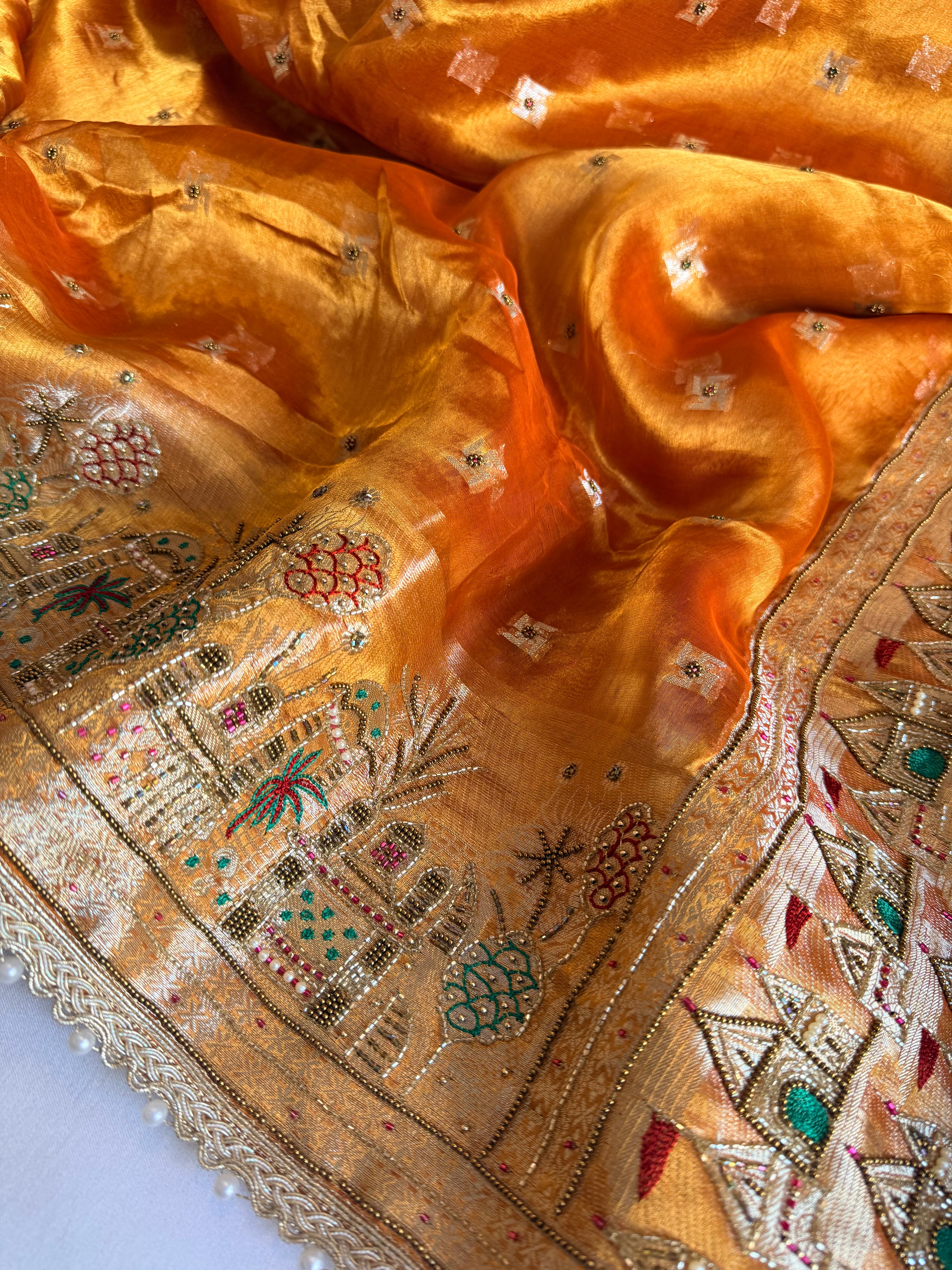Ganga-darshan edit - Tissue silk kanjivaram orange hand embroidered kadhwa saree