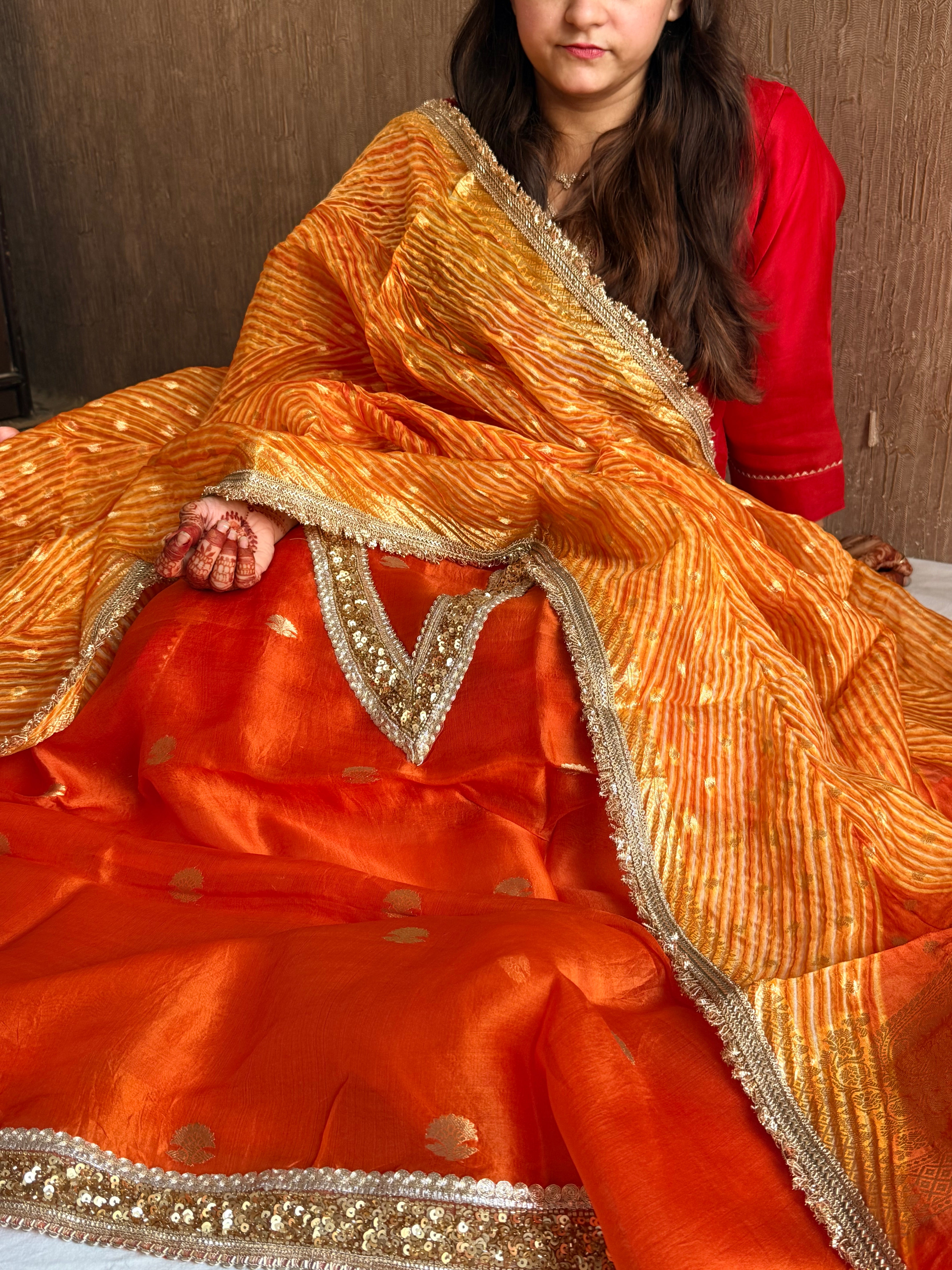 Arshi dye fanta orange sequin work hand embroidered saree