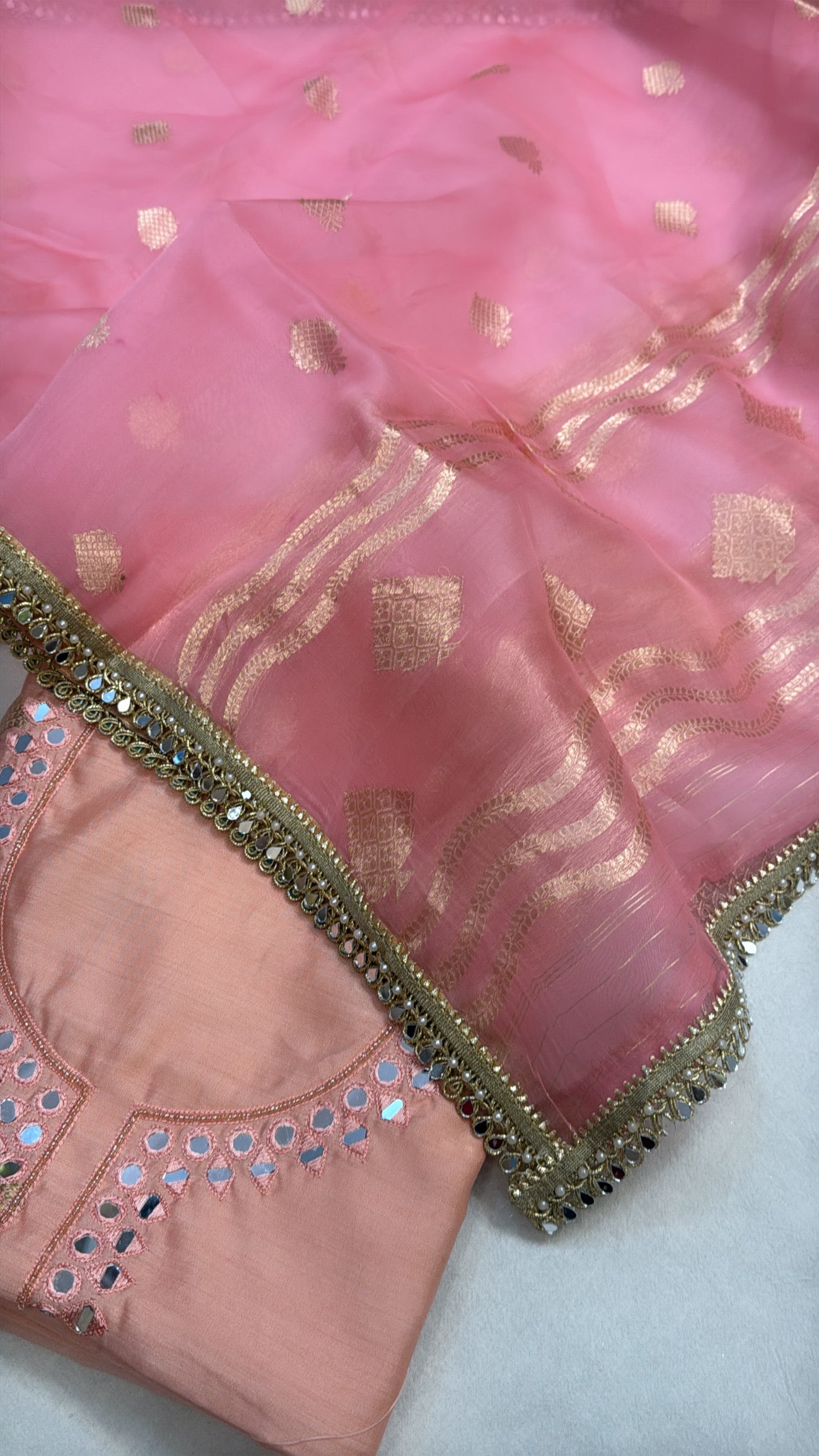 Peachy pink chiniya silk kadhwa kurta paired with kora silk kadhwa duppata