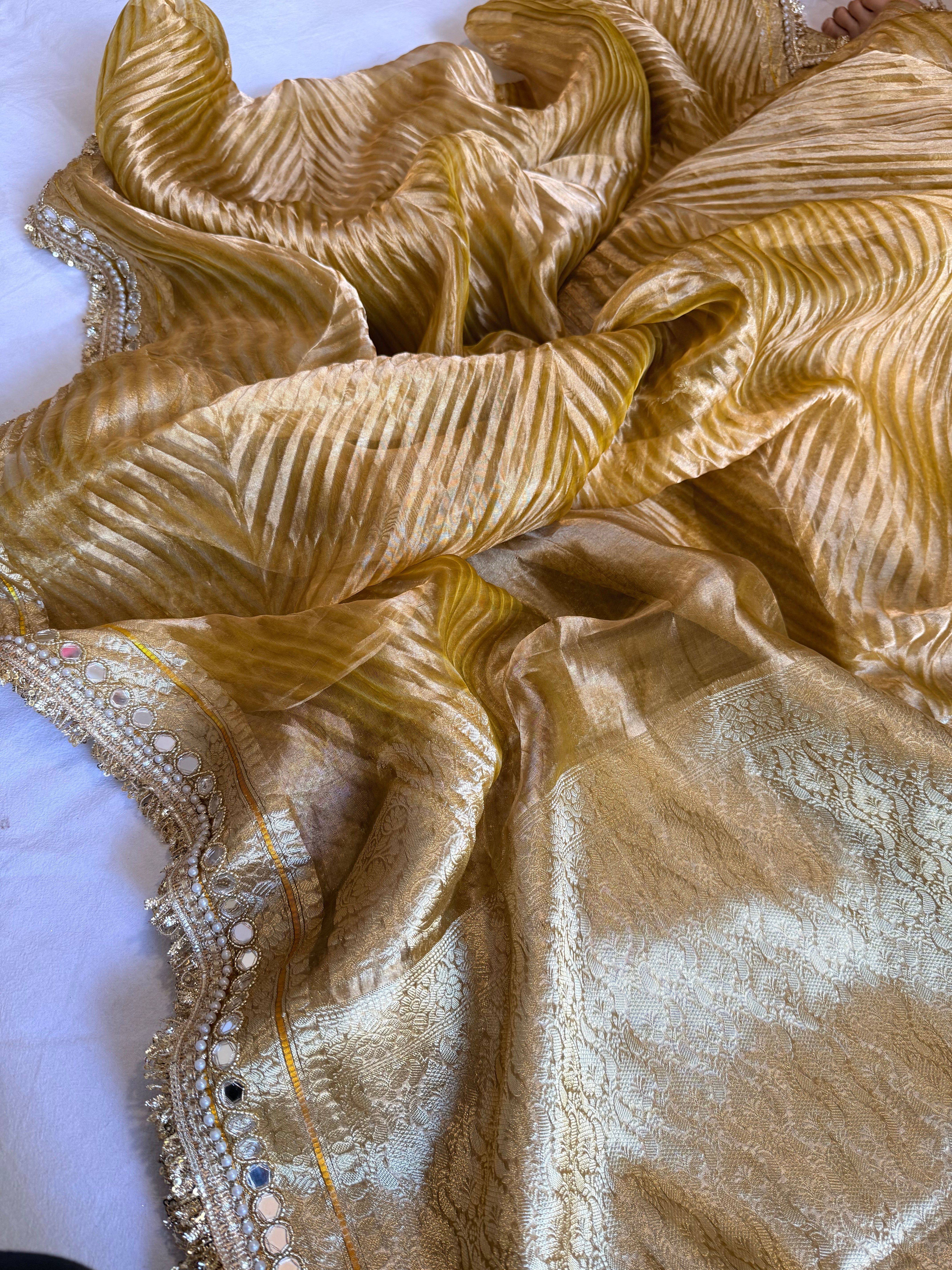 Yellow gold tissue silk arshi dyed mirrorwork hand embroidered kadhwa saree