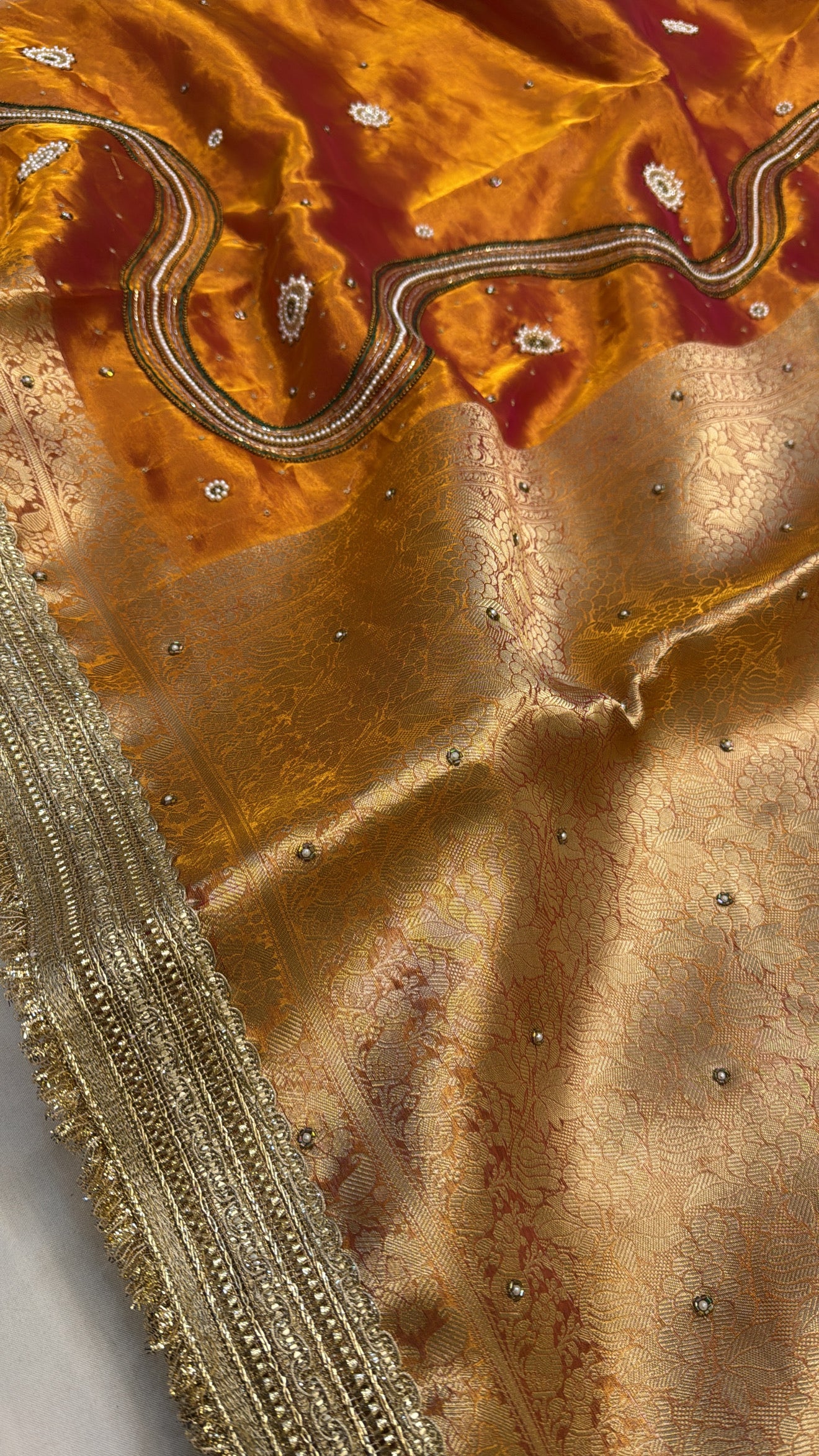 Kanjivaram orange zardozi work husn tissue silk hand embroidered saree