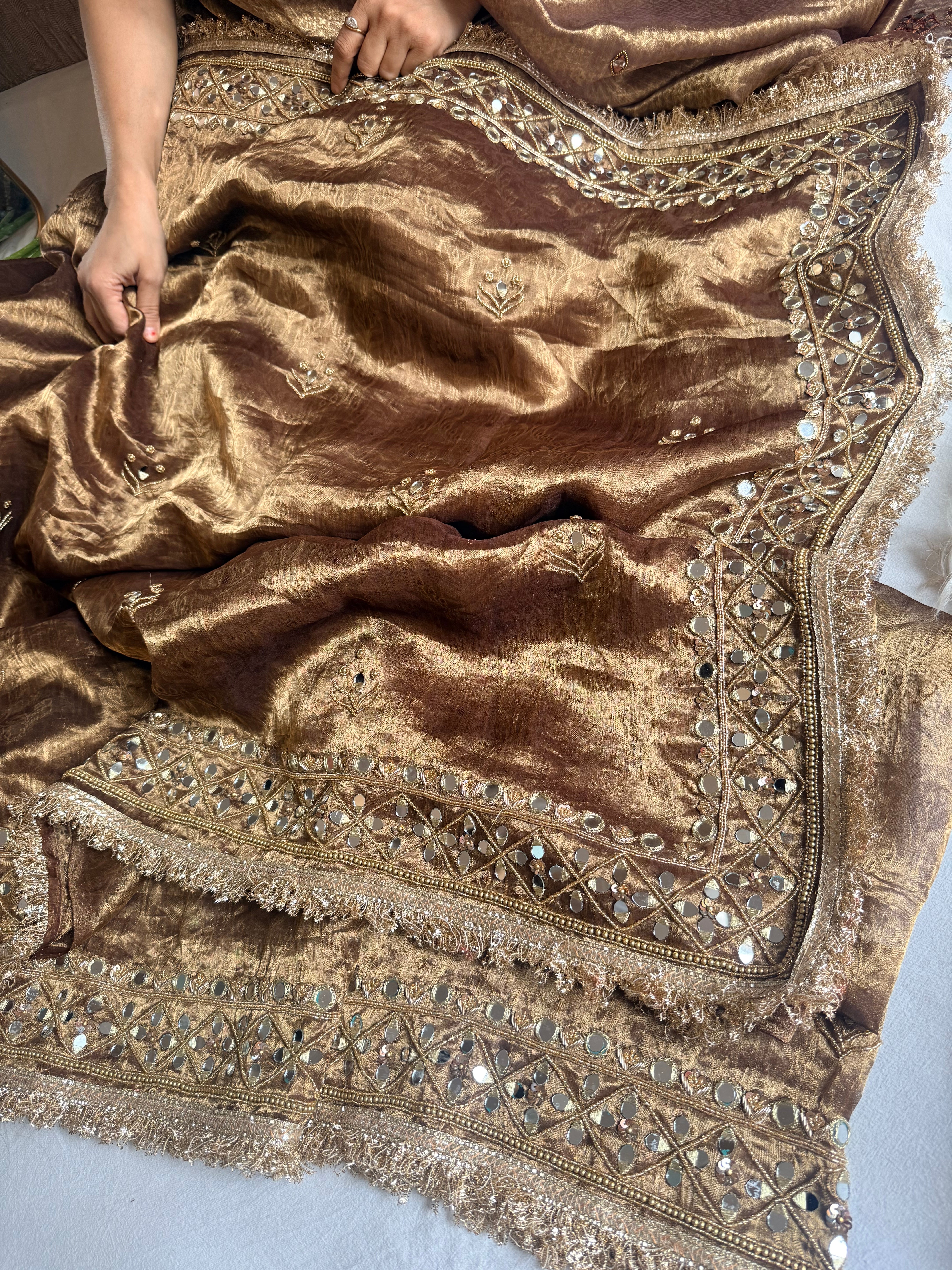 Molten antique gold tissue silk mirrorwork hand embroidered saree