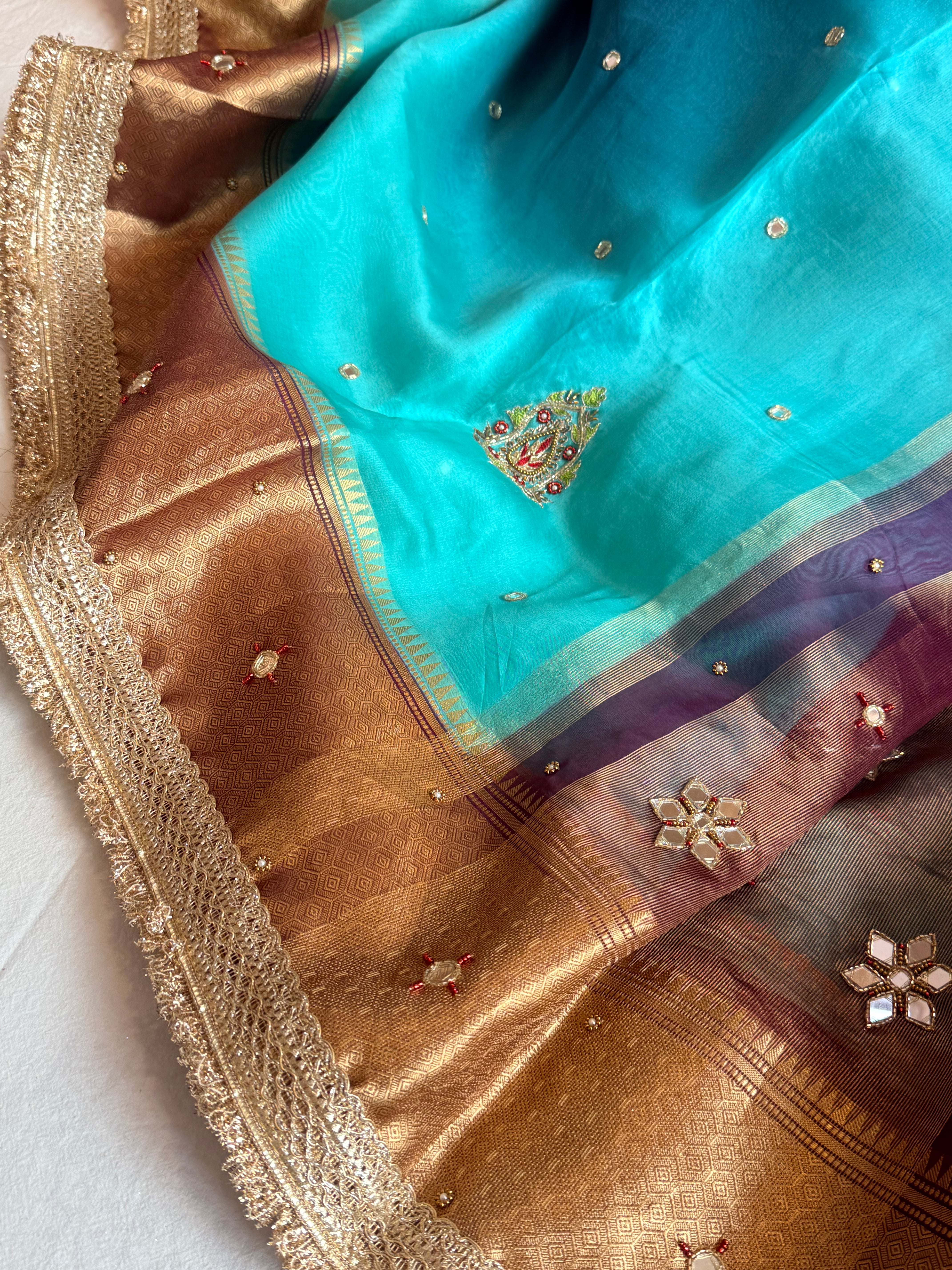Husn ganga jamuna contrast border kora silk hand embroidered saree