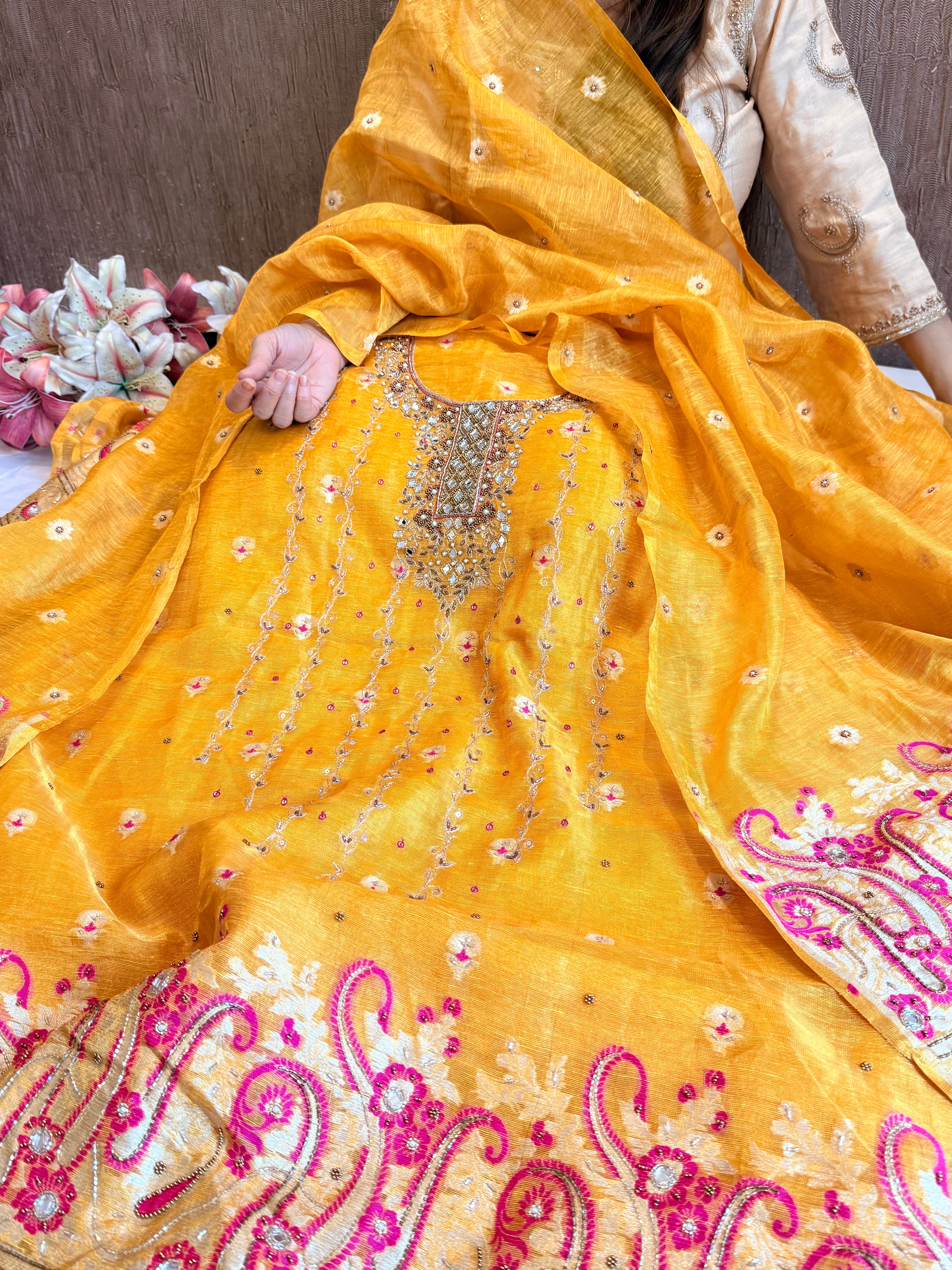 Haldi yellow mul linen tissue silk meenakari hand embroidered suits