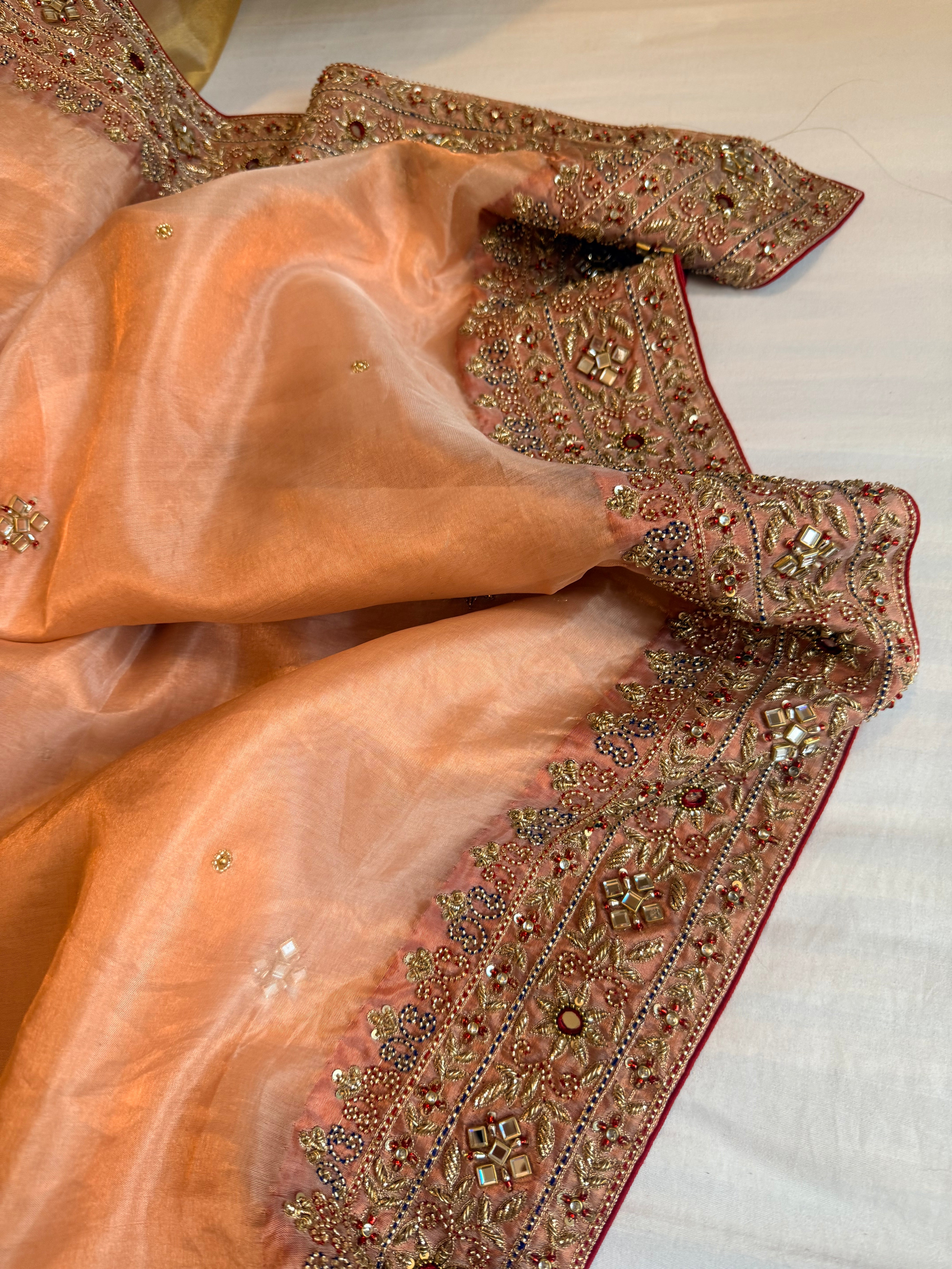 Zardozi & Jadauwork border tissue silk hand embroidered kadhwa copper saree