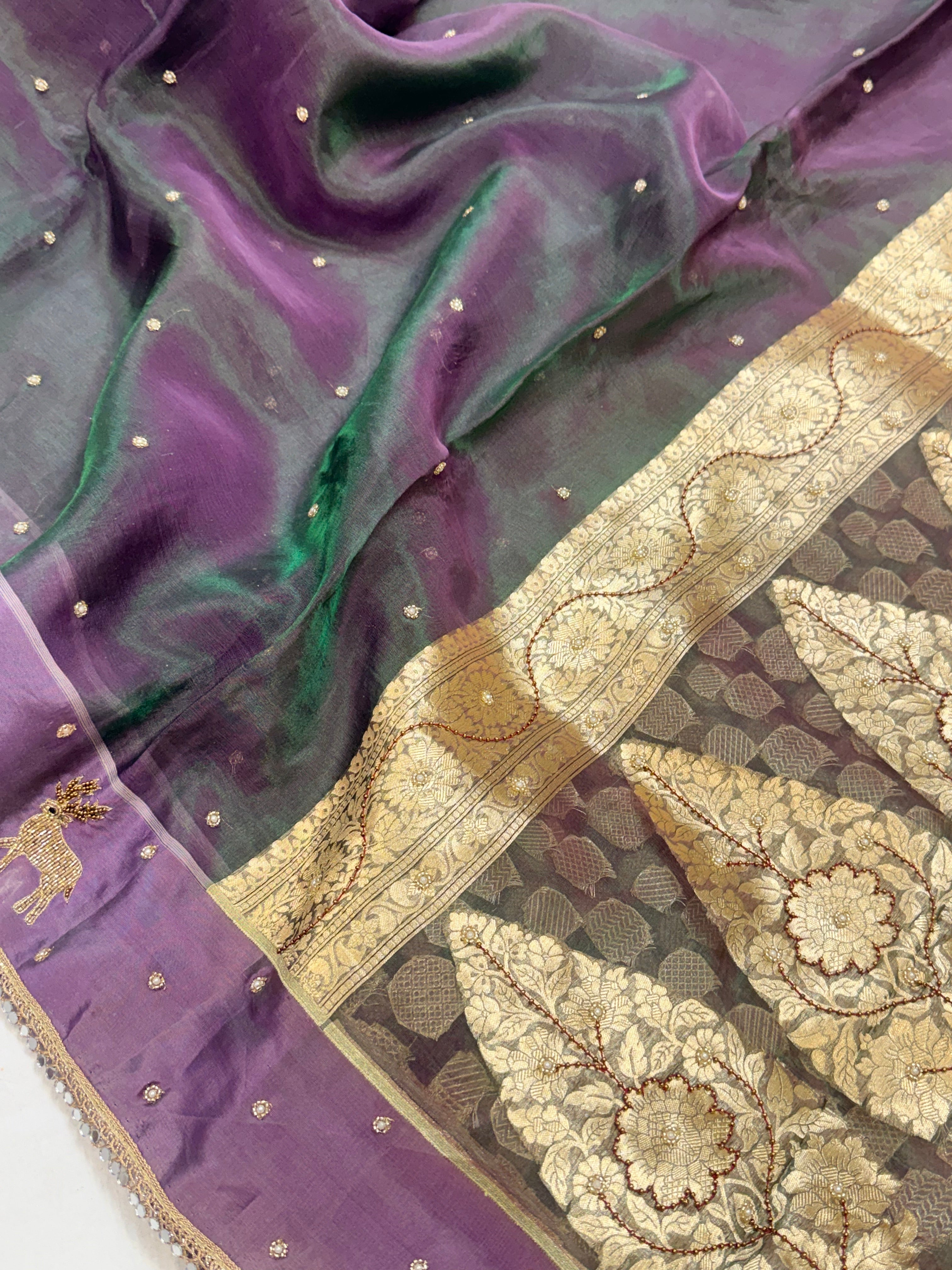 Midnight purple-green dhup chao effect tissue silk hand embroidered saree