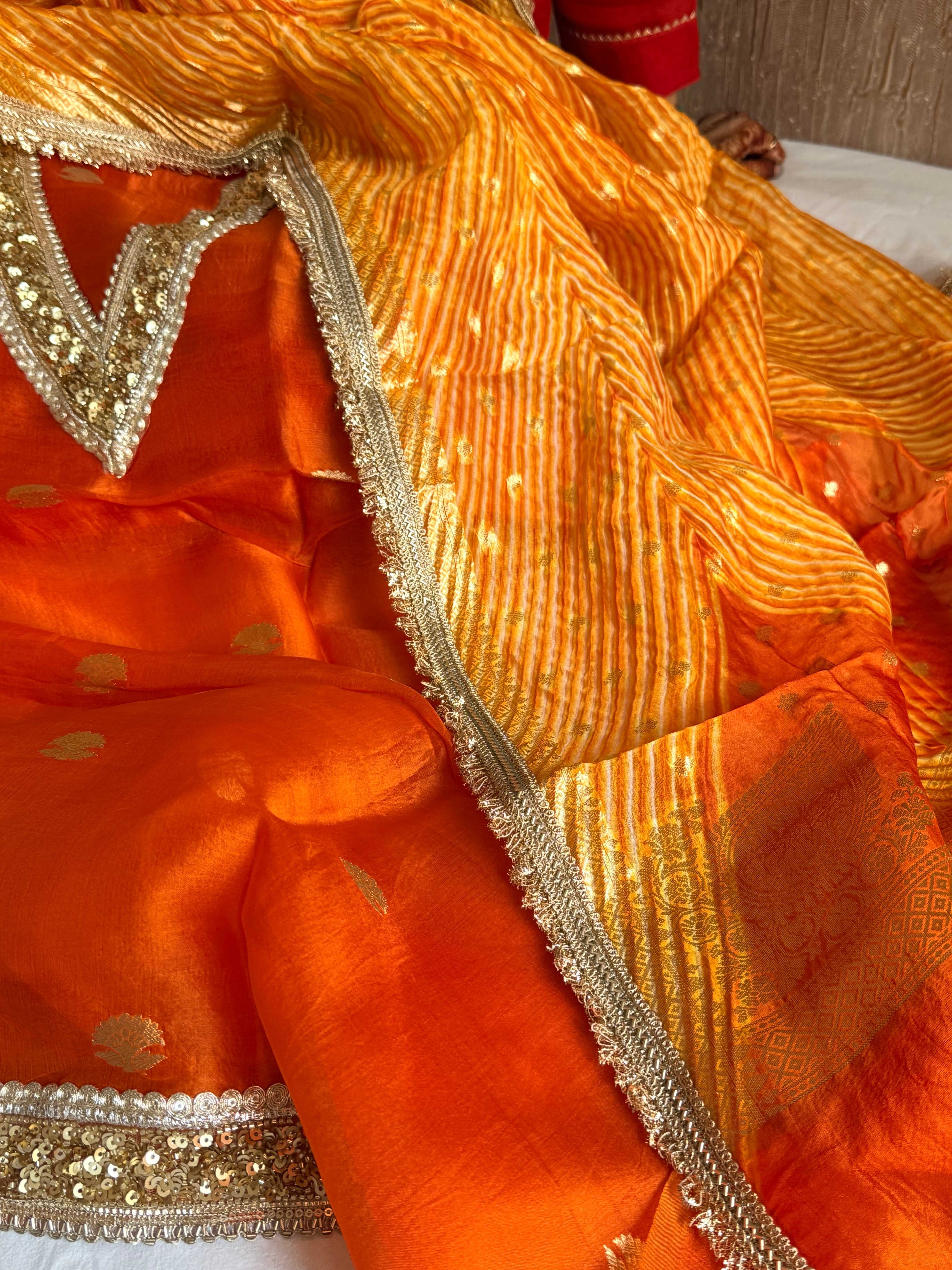 Arshi dye fanta orange sequin work hand embroidered saree