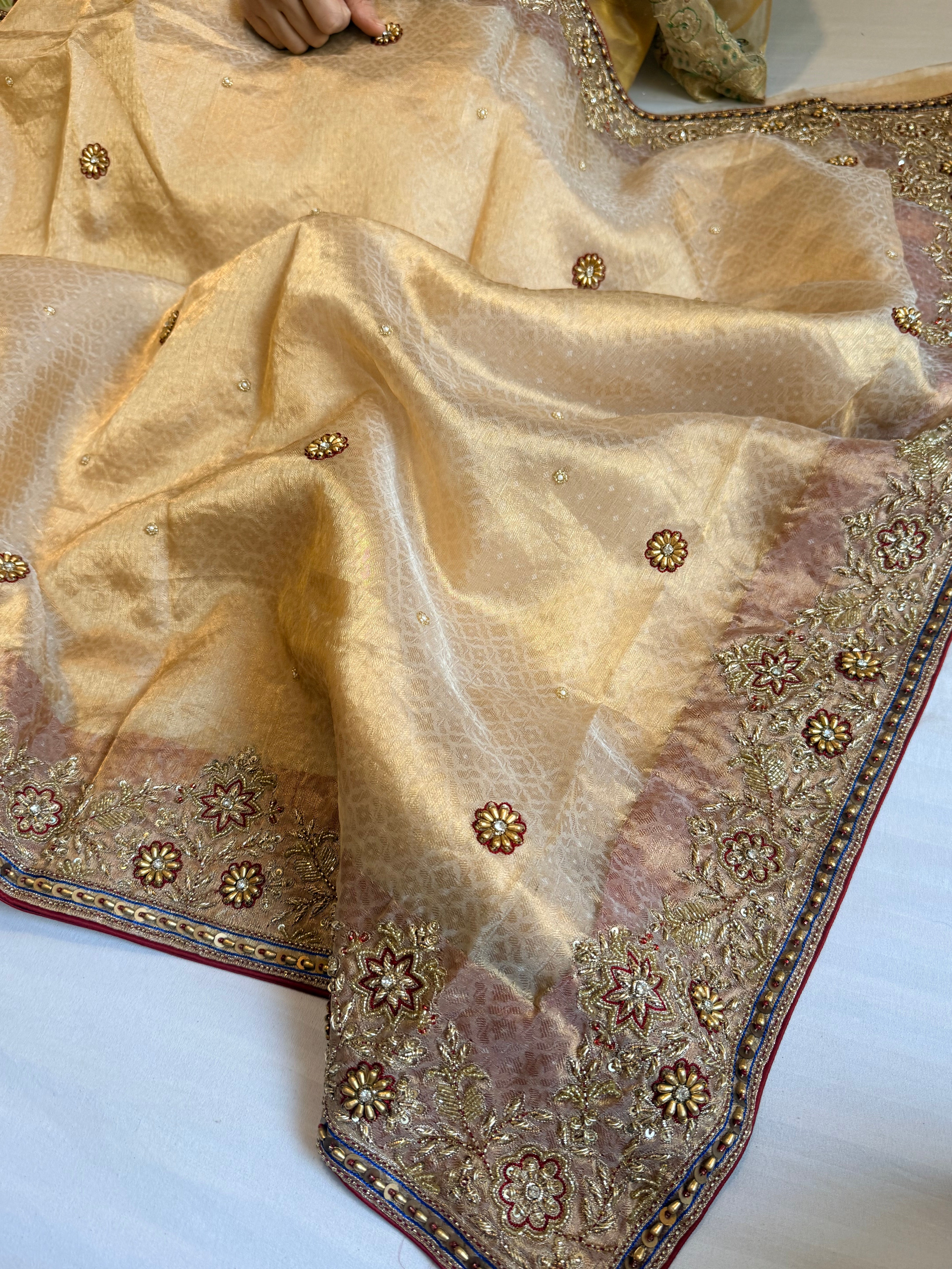 Zardozi & Jadauwork border tissue silk hand embroidered kadhwa butter gold saree