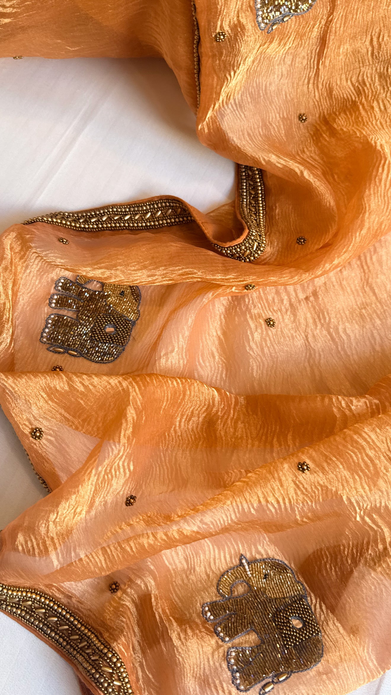 Mirrorwork edit gajri peach crushed tissue silk hand embroidered saree