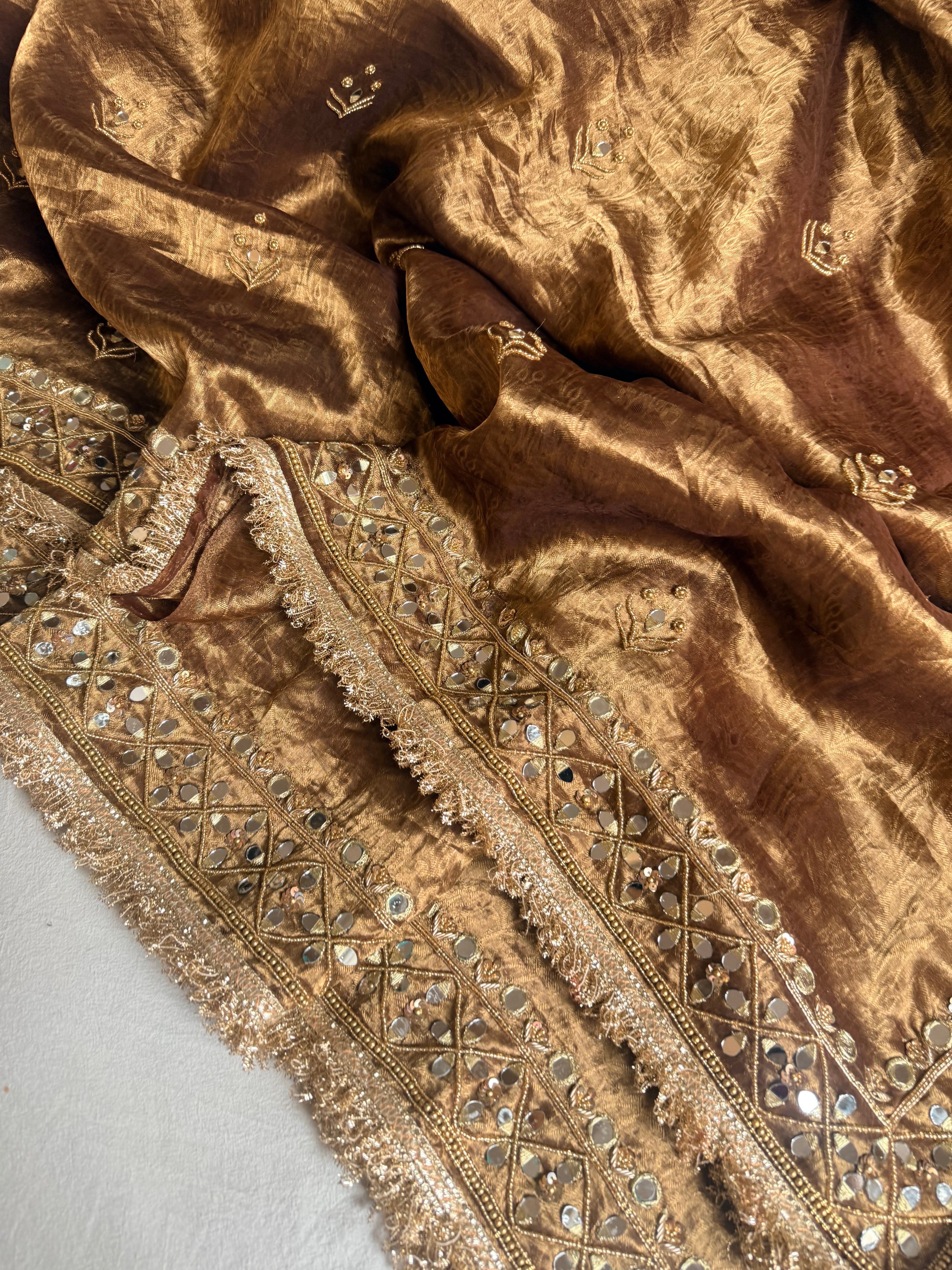 Molten antique gold tissue silk mirrorwork hand embroidered saree