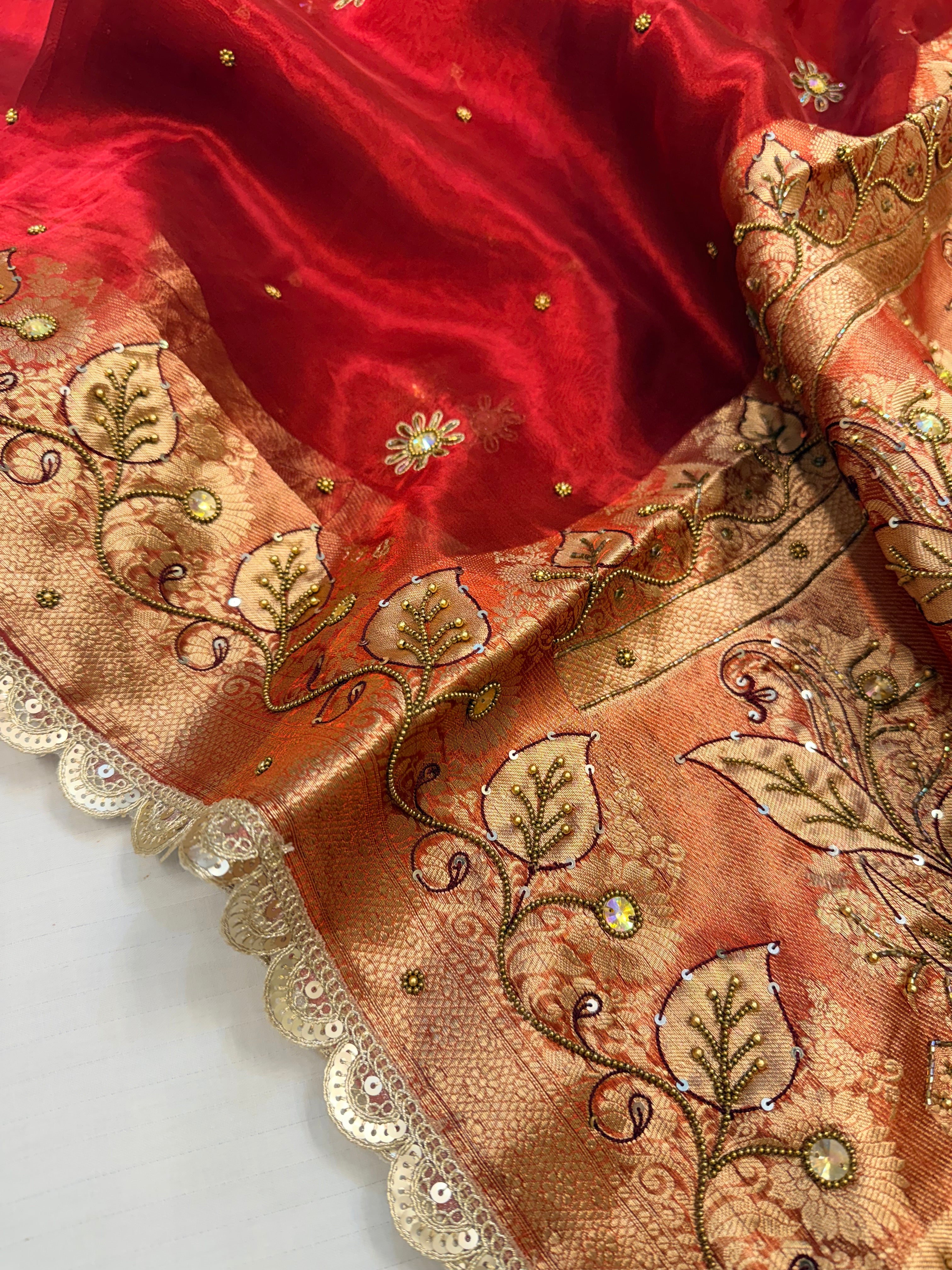 Blood red husn tissue silk hand embroidered kadhwa saree