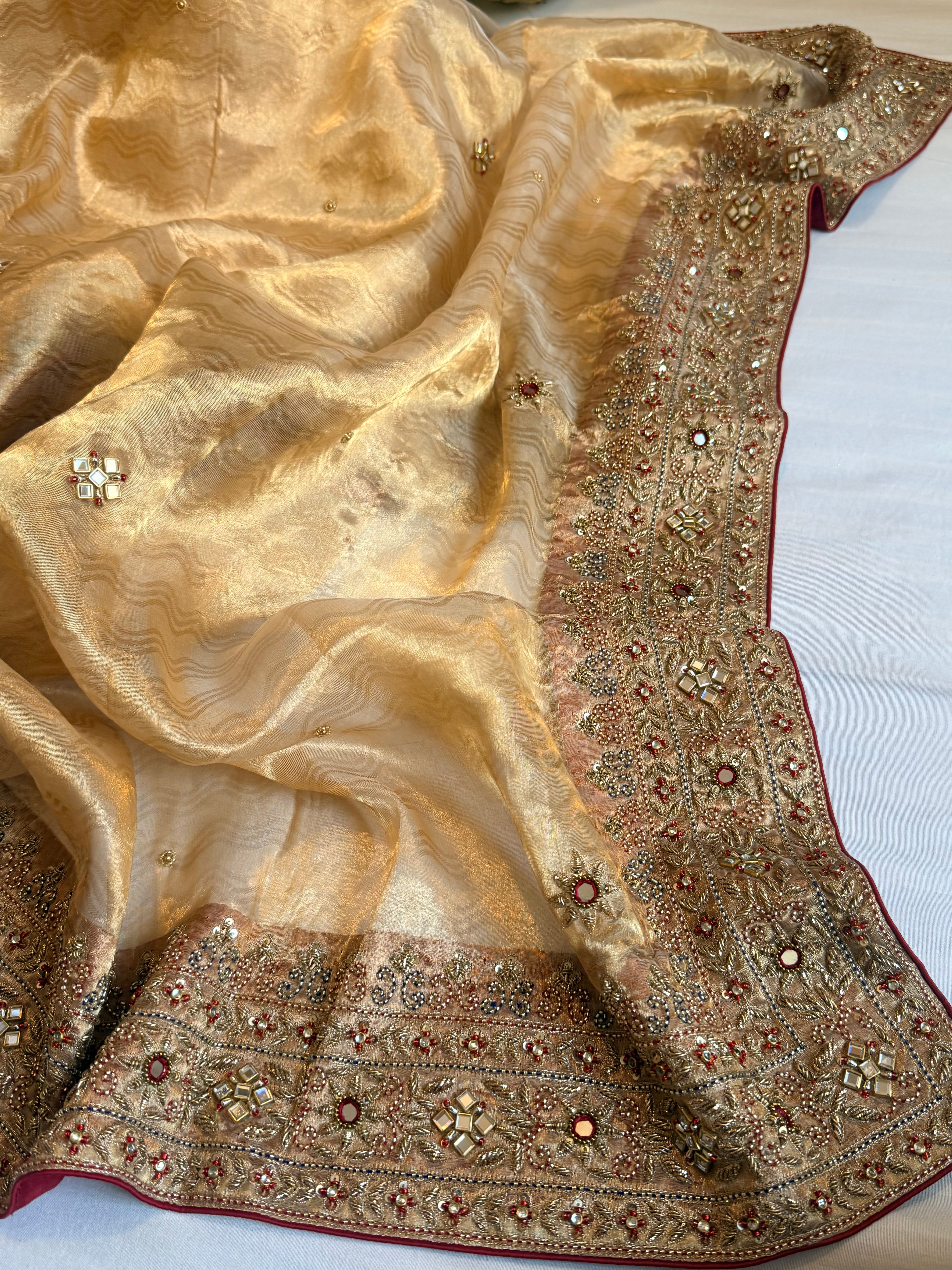 Zardozi & Jadauwork border tissue silk hand embroidered kadhwa butter gold saree
