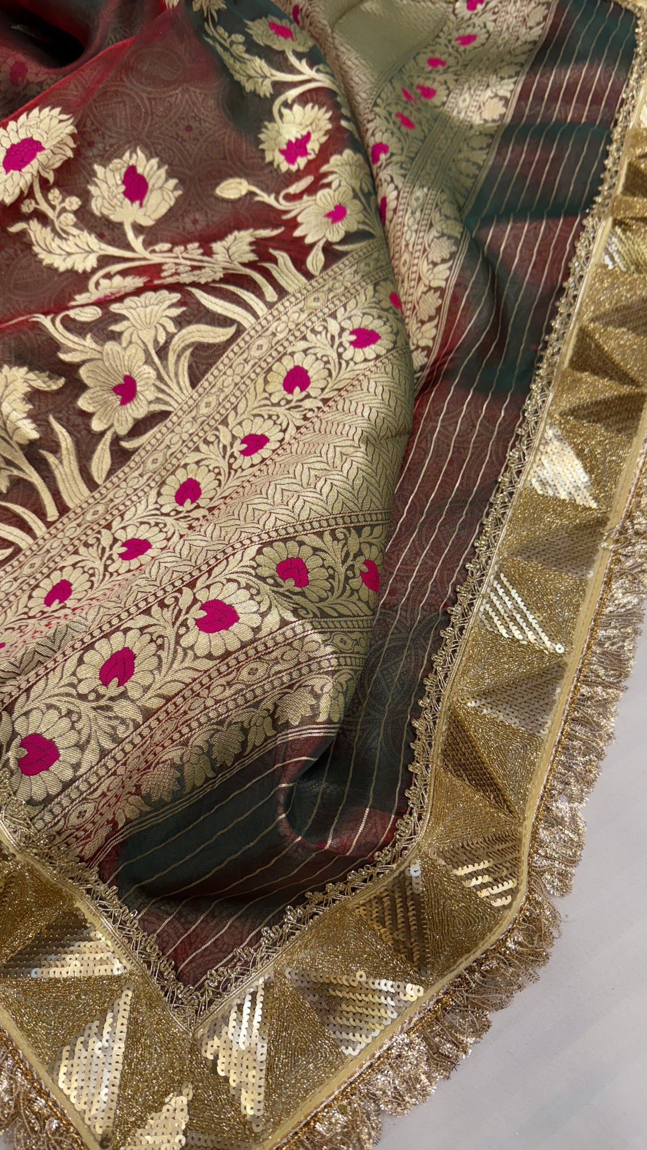 Maharani blood red dhup chao effect tissue silk meenakari saree