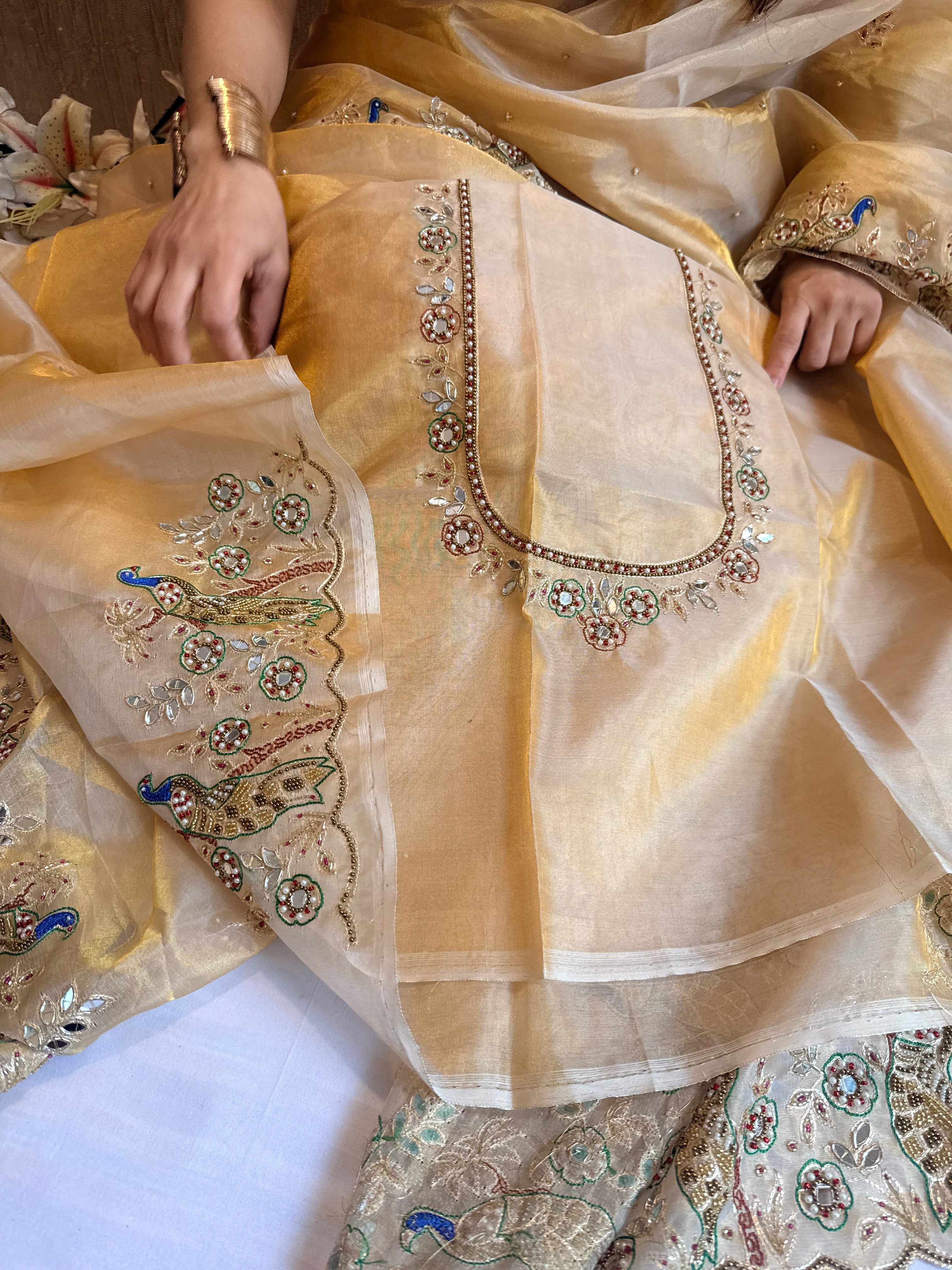 Zardozi & Jadauwork border tissue silk hand embroidered kadhwa gold saree