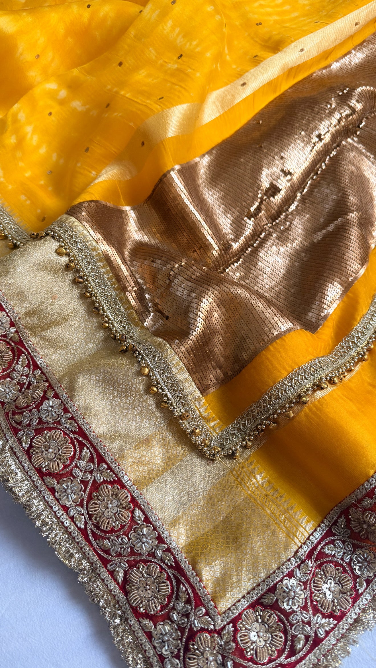 Chan Chan ghungroo haldi yellow work kora silk leheriya dye kadhwa saree