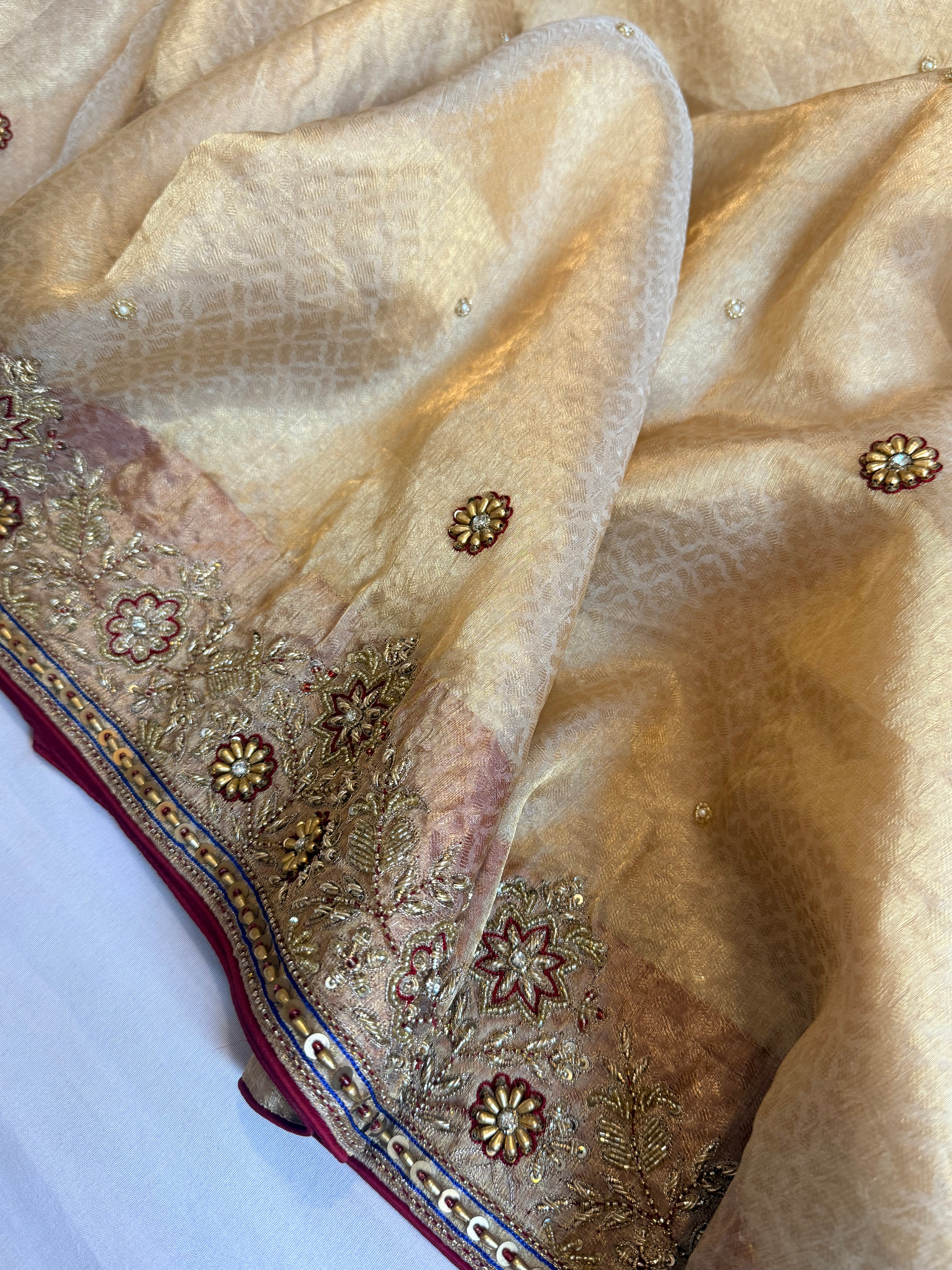 Zardozi & Jadauwork border tissue silk hand embroidered kadhwa butter gold saree