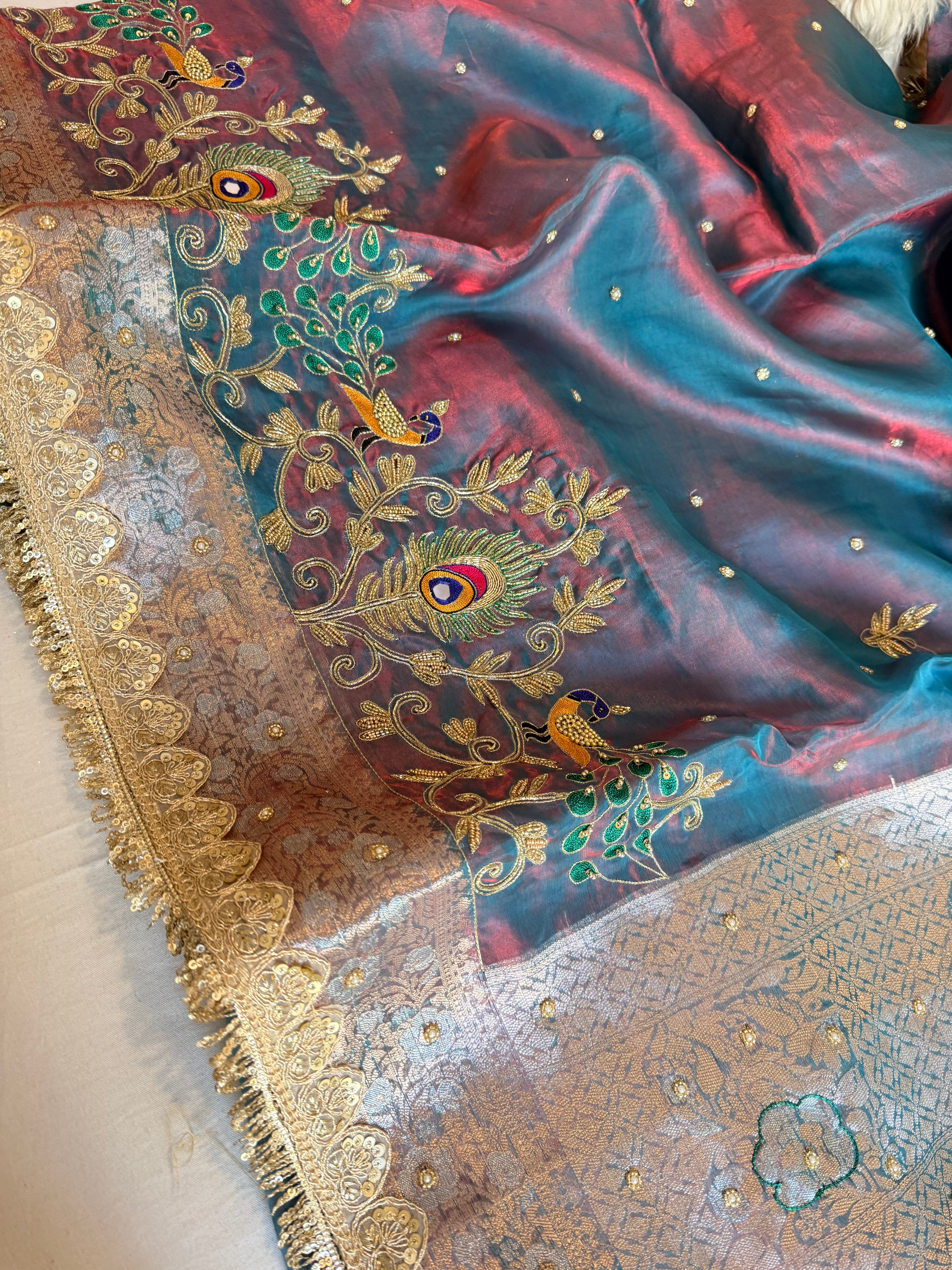 Morpankh motif husn dhup chao effect tissue silk hand embroidered kadhwa saree