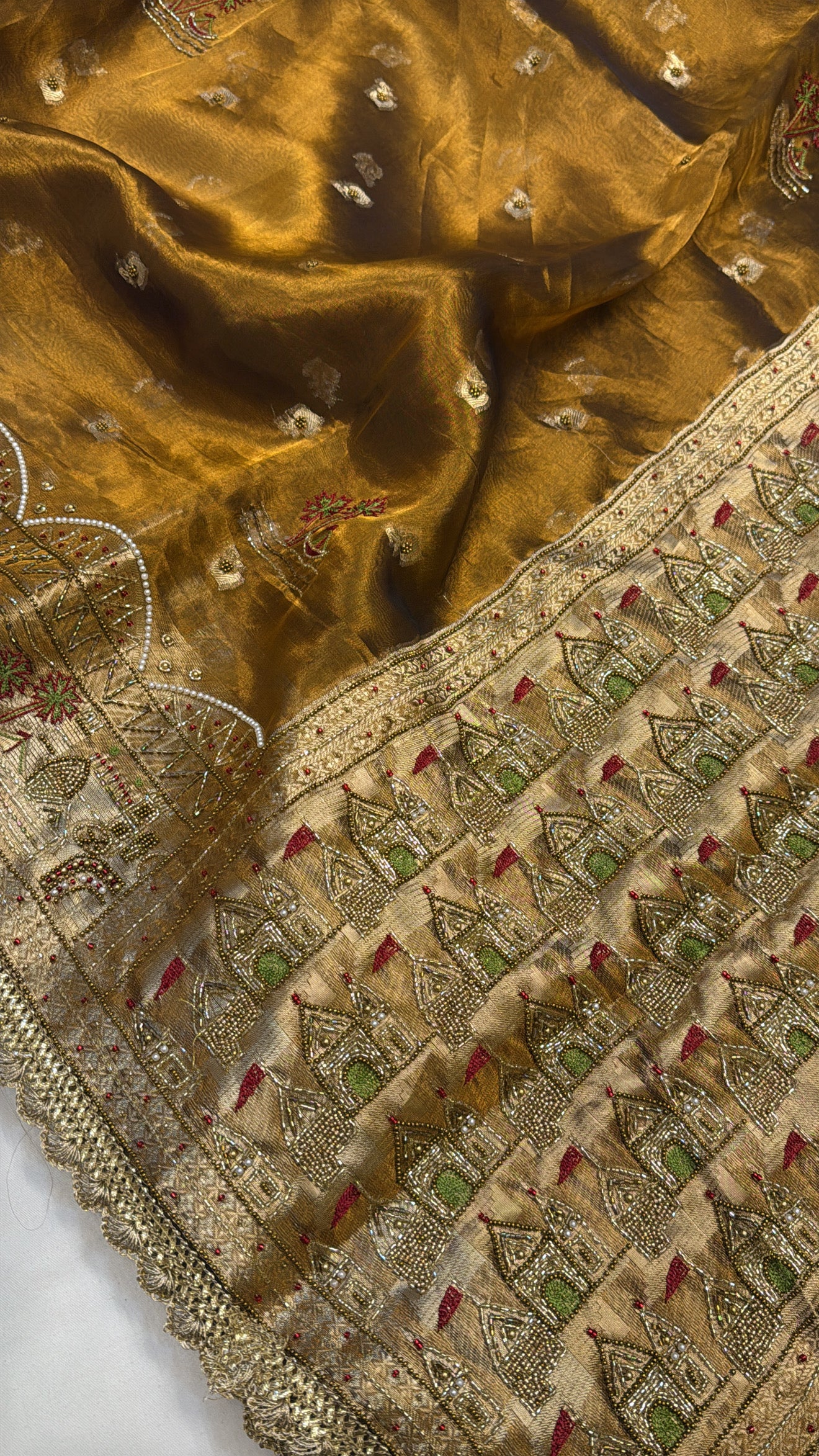 Gangakinare edit molten gold tissue silk hand embroidered saree