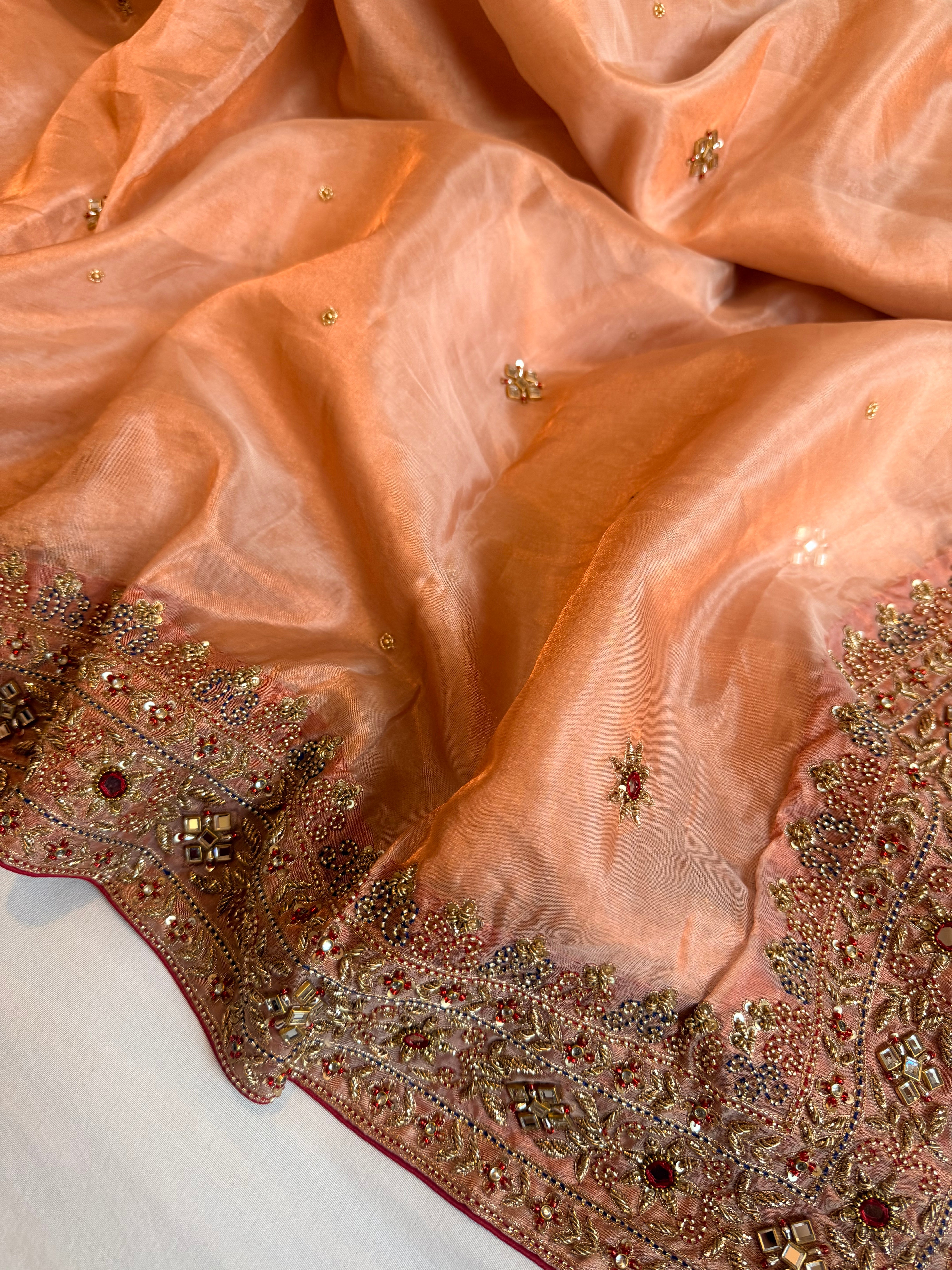 Zardozi & Jadauwork border tissue silk hand embroidered kadhwa copper saree