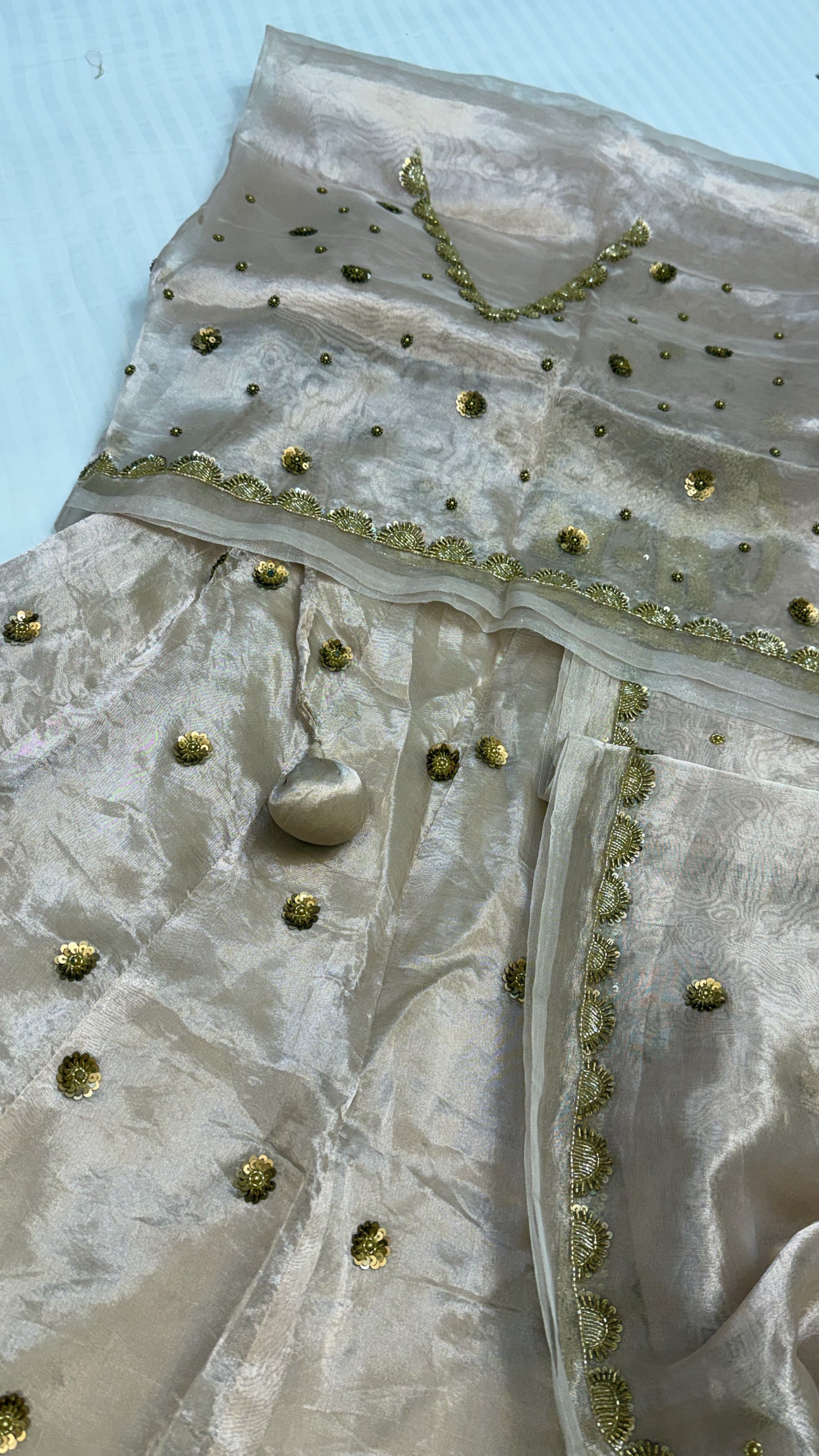 Gajgamini diamond tissue silk light rose gold zari elephant motif hand embroidered lehenga sets