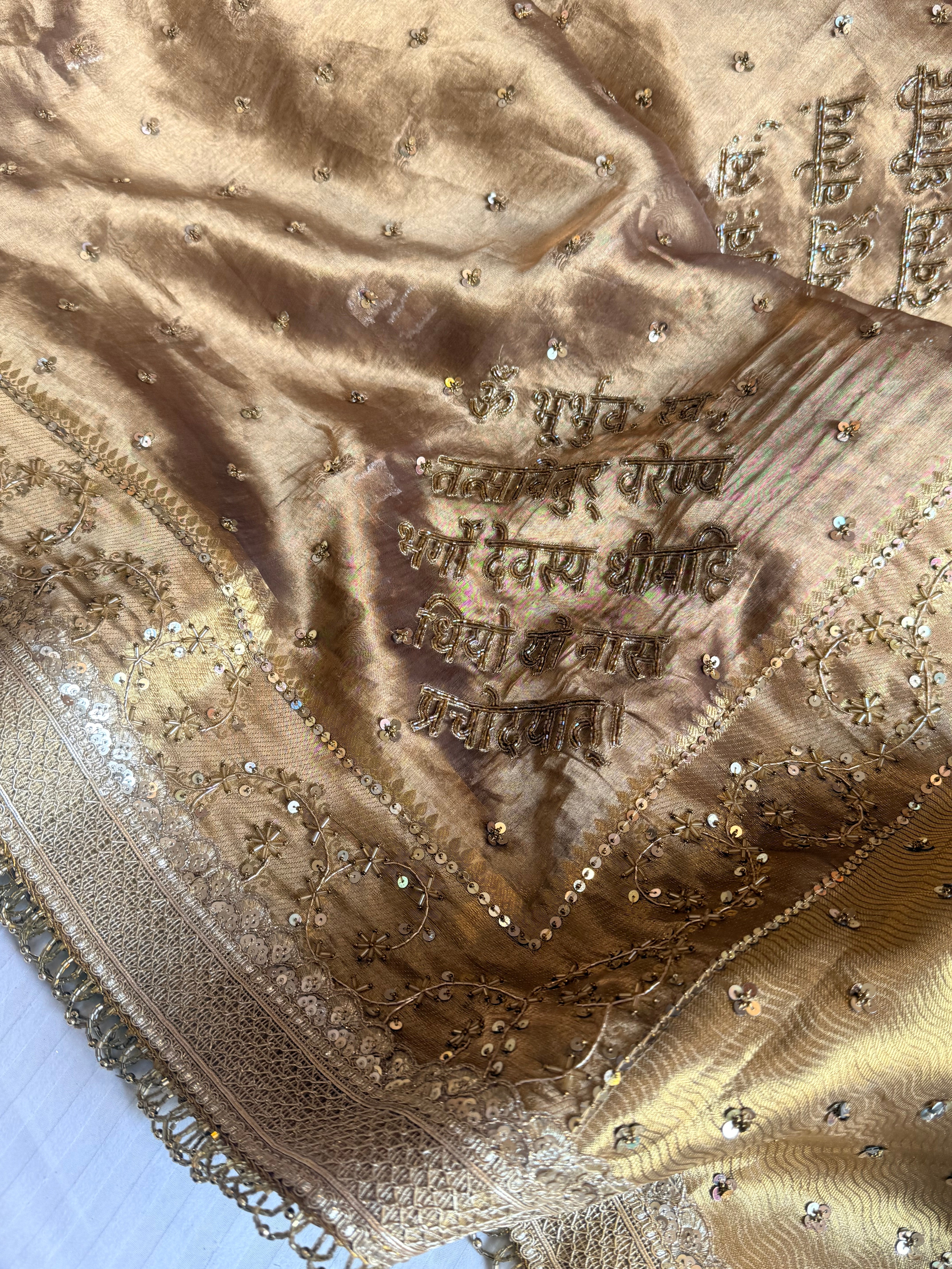 Salma-sitara molten antique gold tissue silk gayatri mantra hand embroidered saree