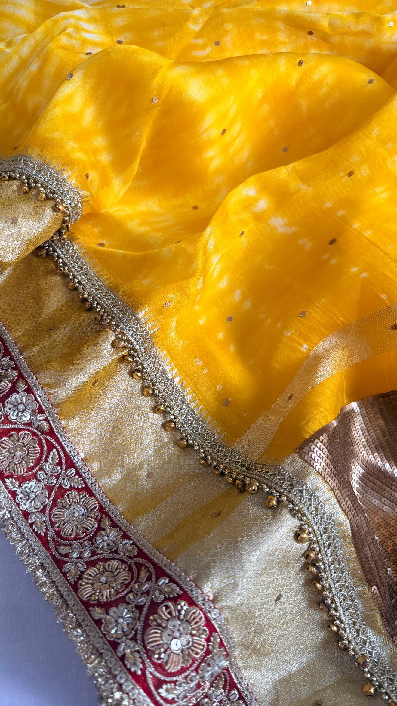 Chan Chan ghungroo haldi yellow work kora silk leheriya dye kadhwa saree