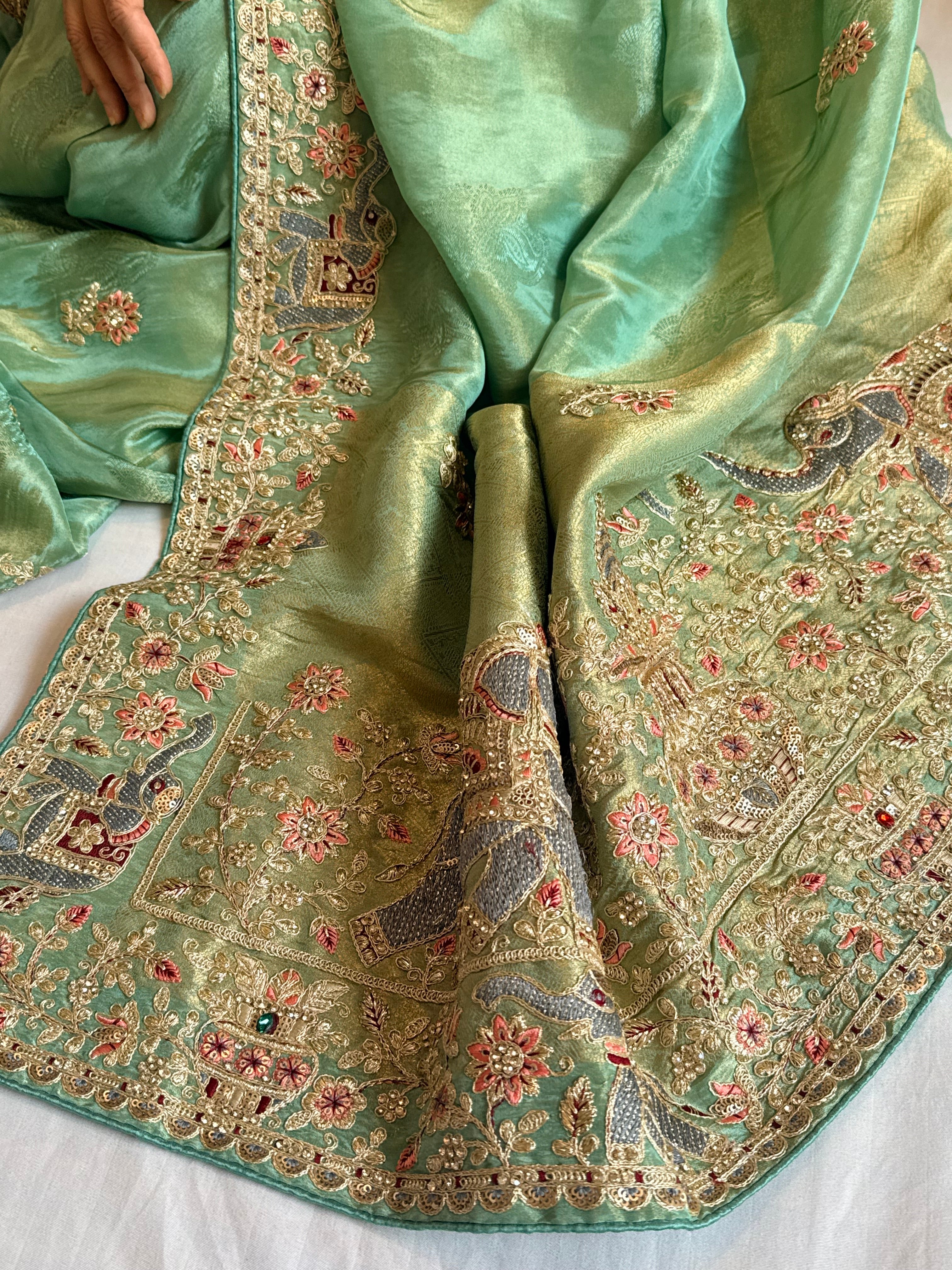 Sea green hathi wali crepe tissue embroidered saree