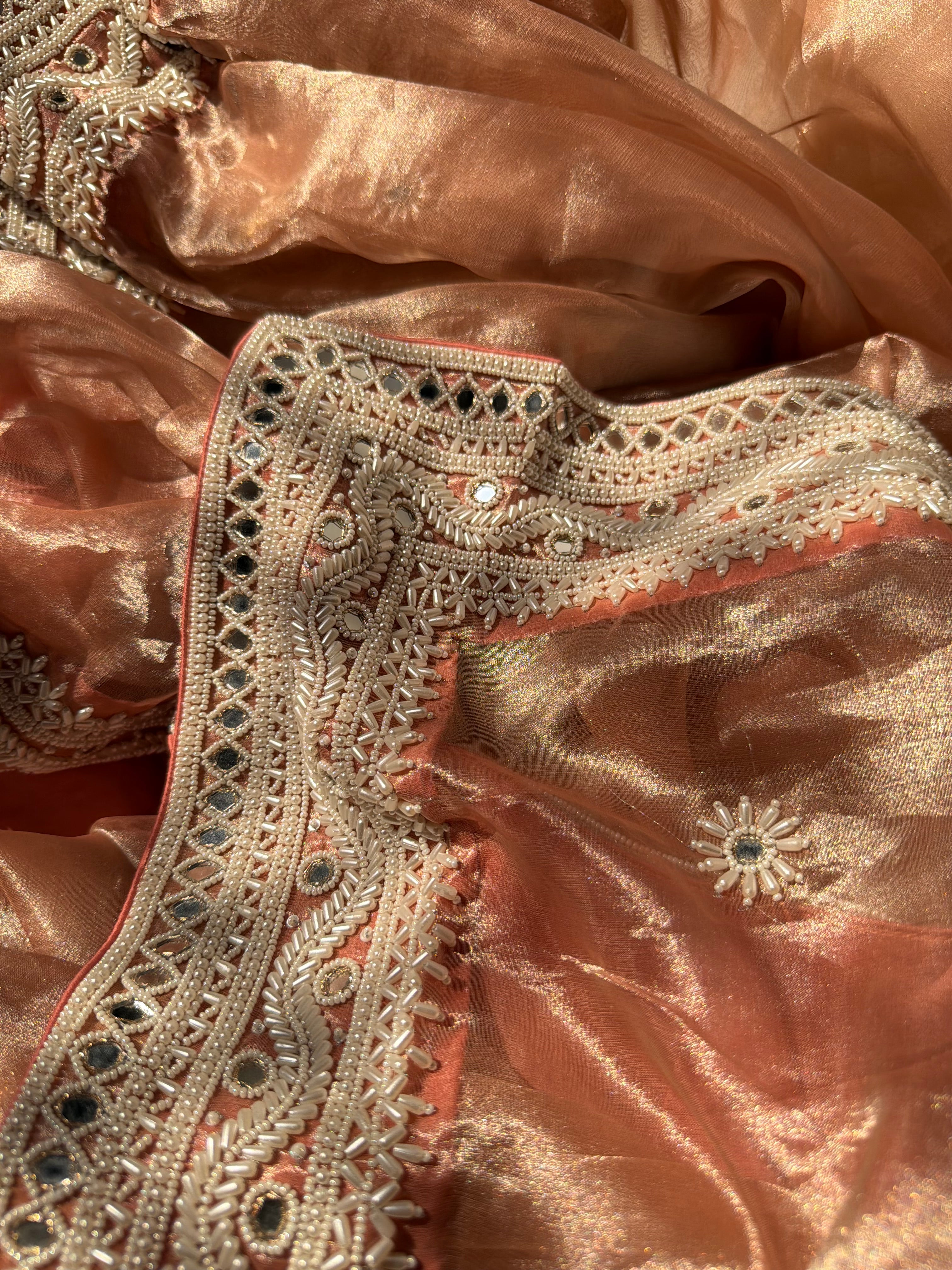 Gajri peach mirrorwork and pearlwork hand embroidered diamond tissue saree