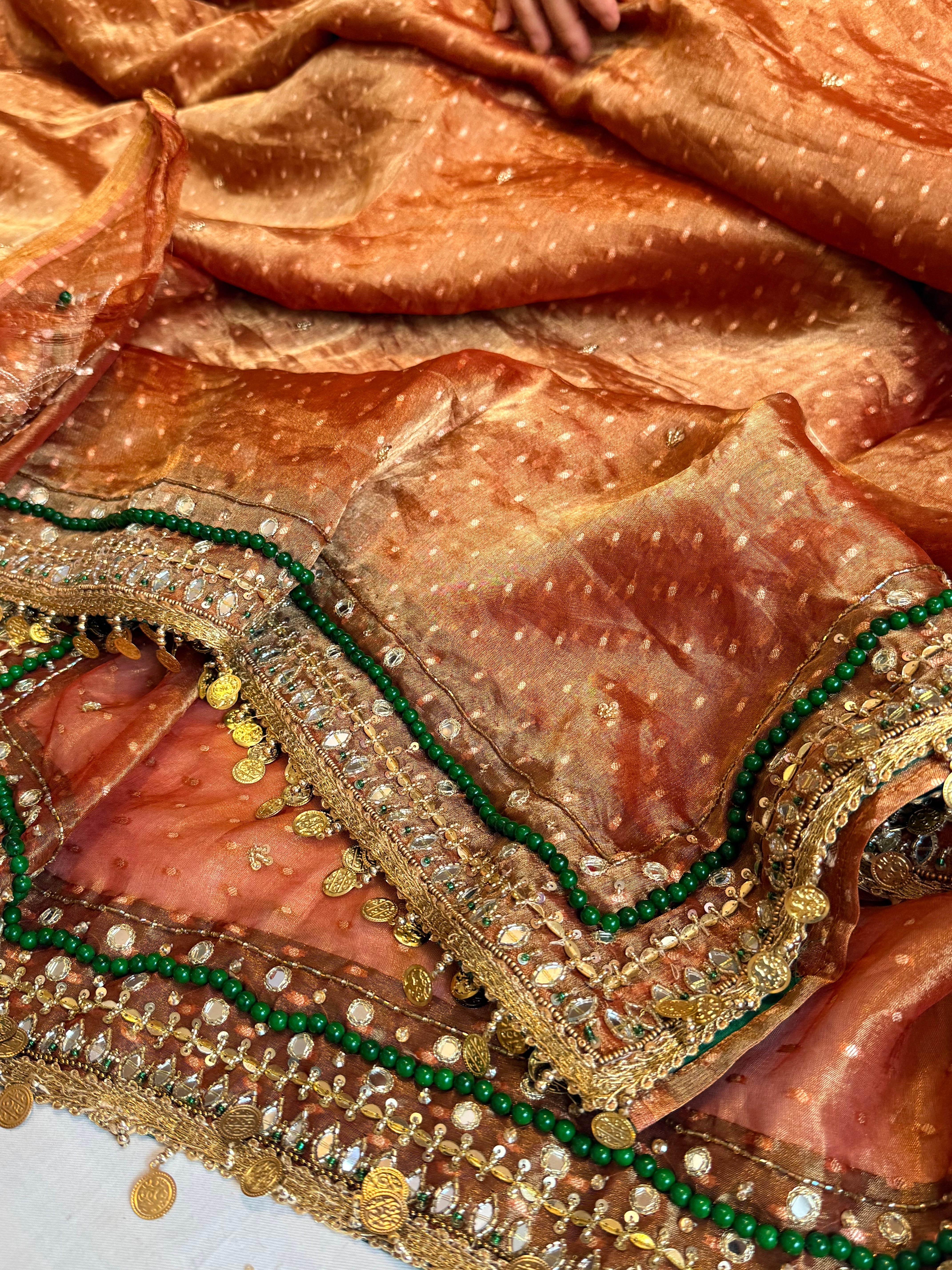 Heera & Panna tissue silk chunri buti hand embroidered kadhwa saree