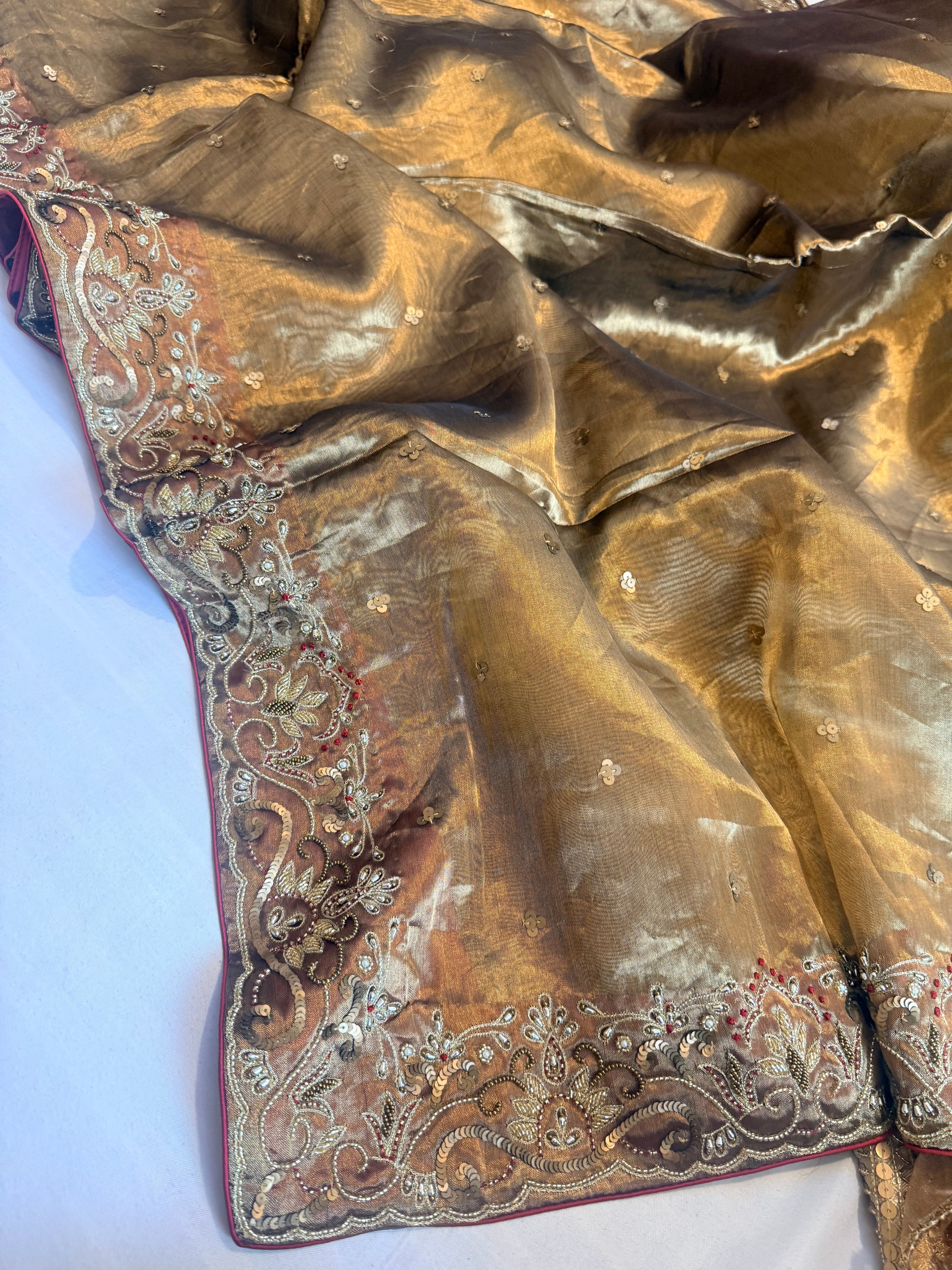 Molten gold tissue silk hand embroidered kadhwa weaving saree