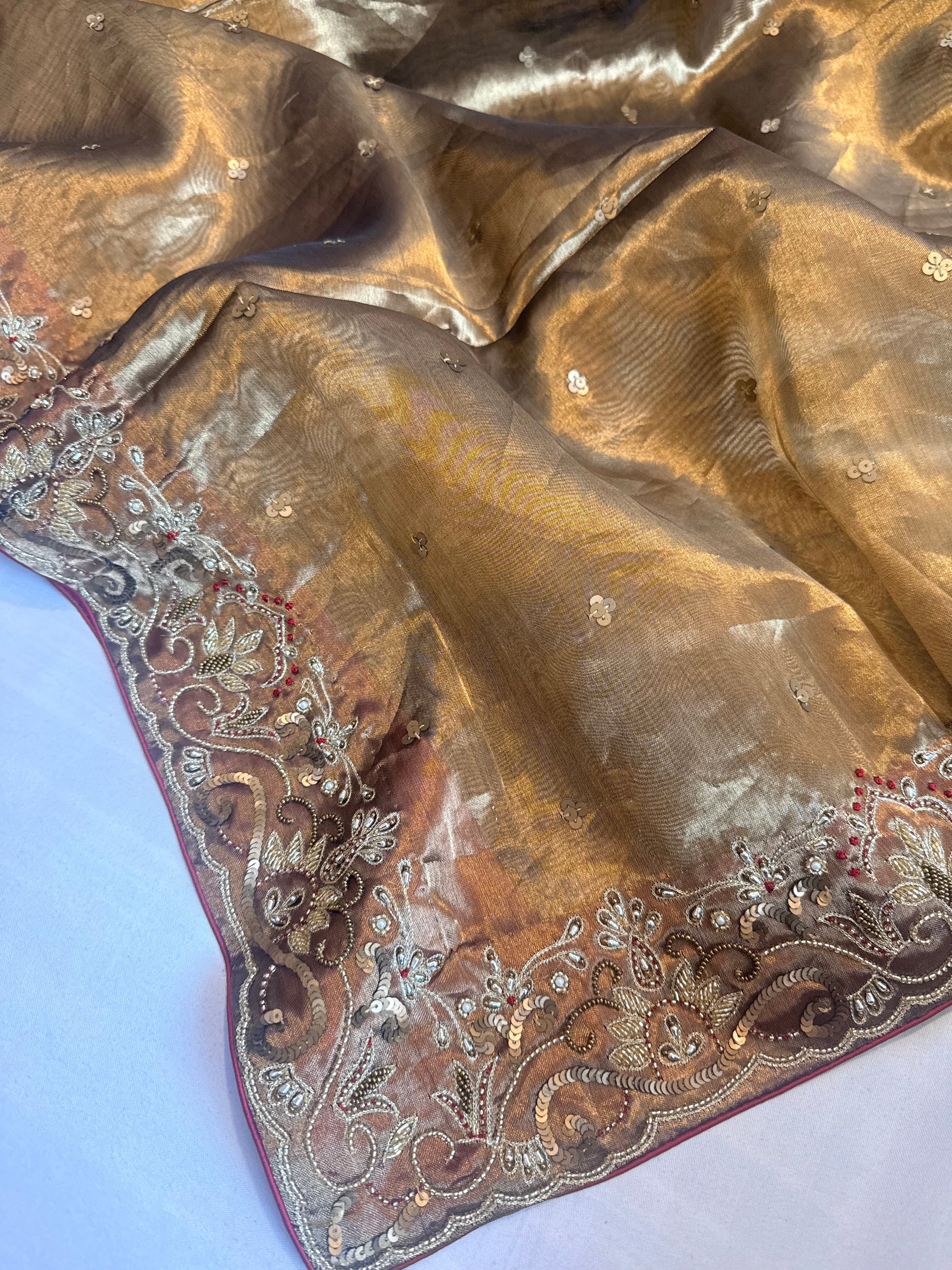 Molten gold tissue silk hand embroidered kadhwa weaving saree