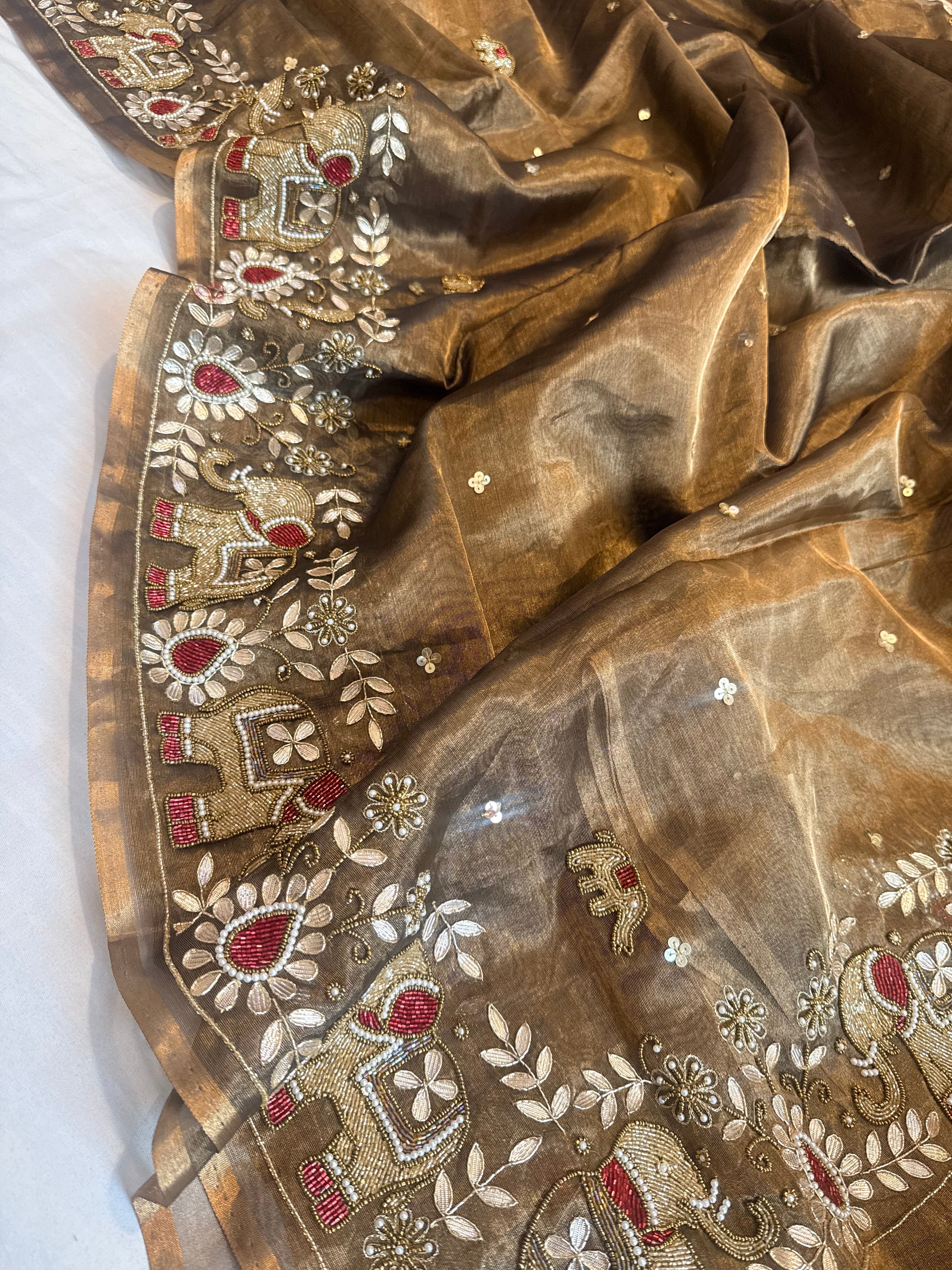 Hathi wali molten antique gold tissue silk hand embroidered saree