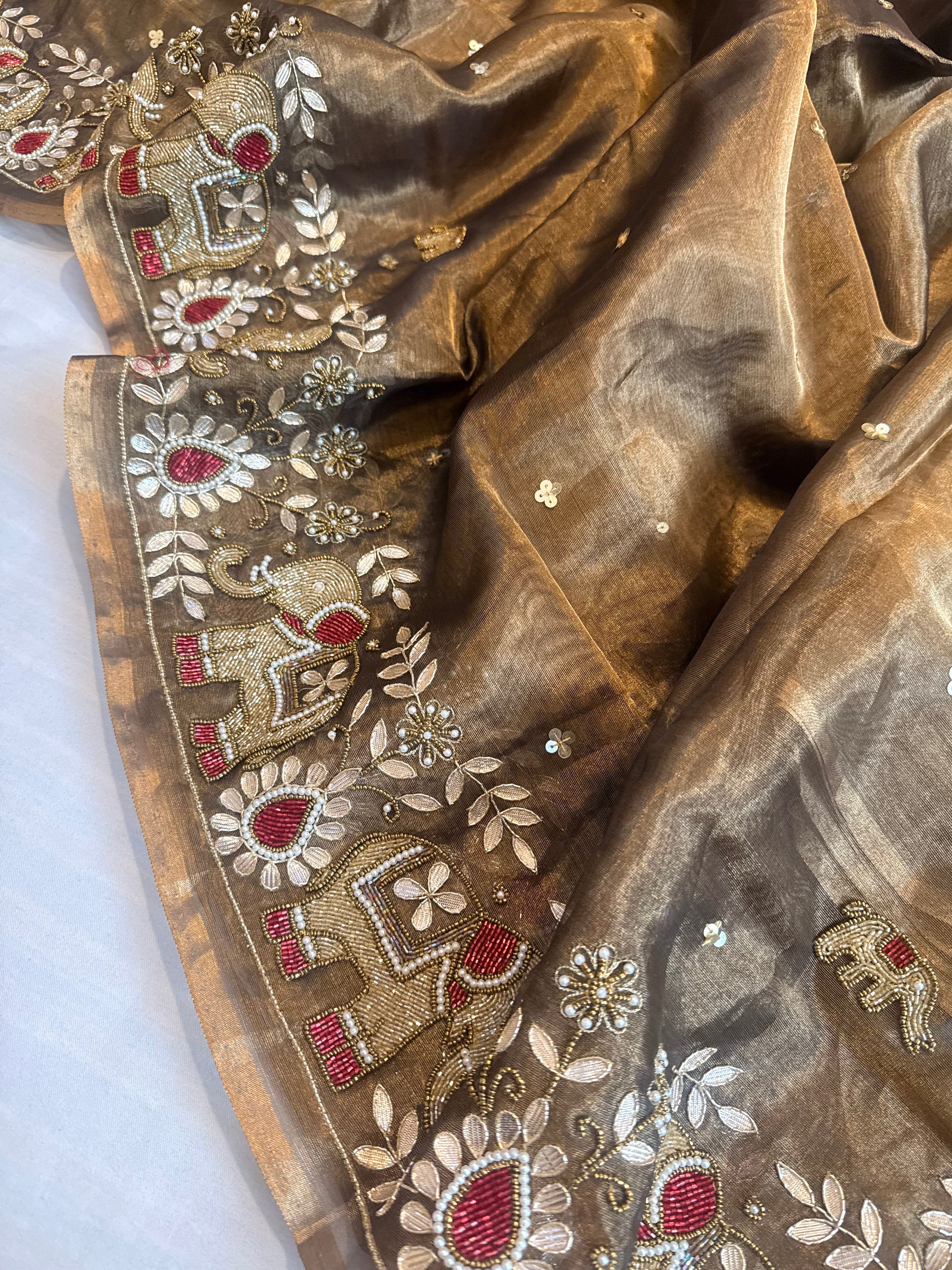 Hathi wali molten antique gold tissue silk hand embroidered saree