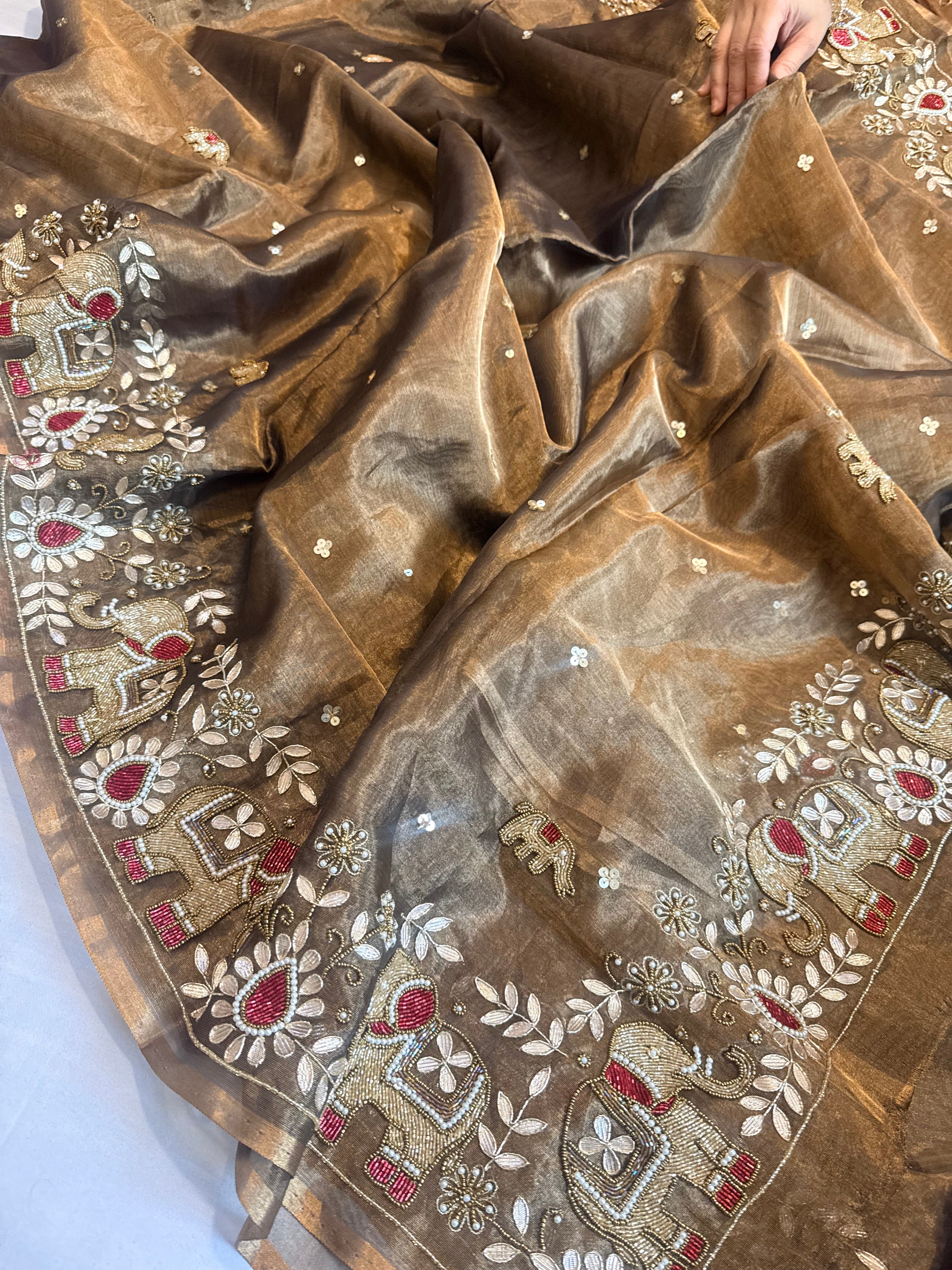 Hathi wali molten antique gold tissue silk hand embroidered saree