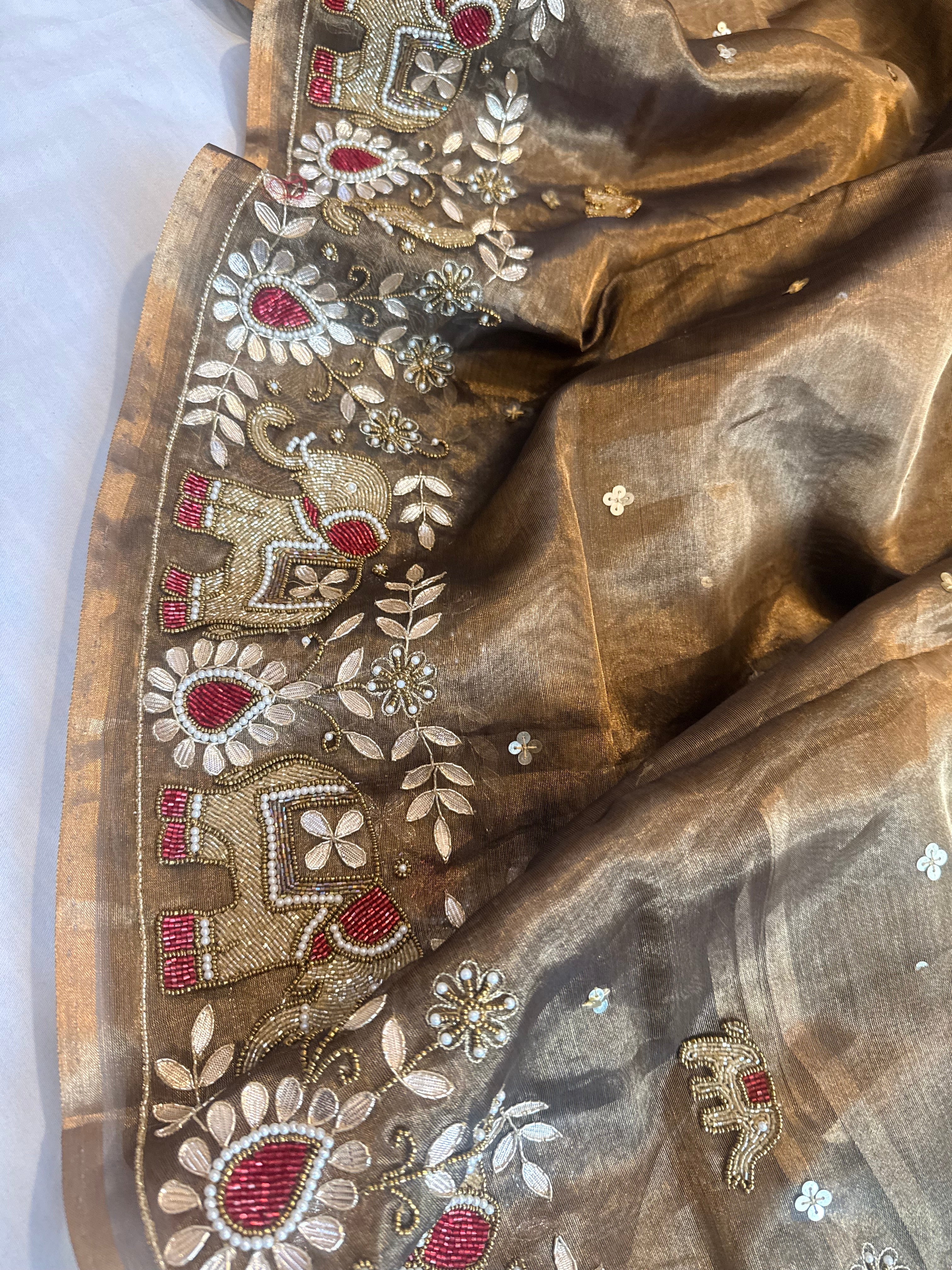 Hathi wali molten antique gold tissue silk hand embroidered saree